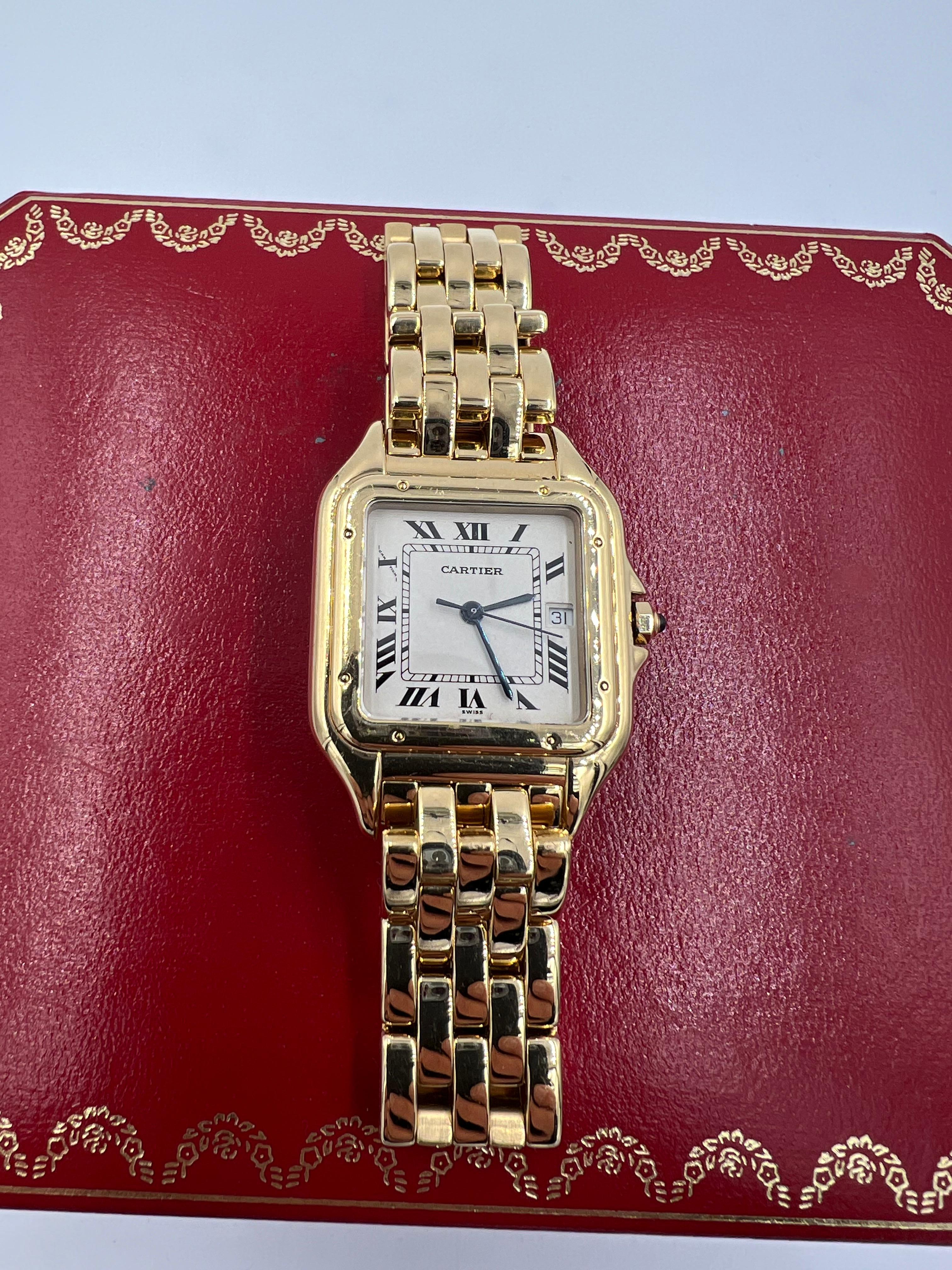 Cartier Panther yellow gold quartz wristwatch with date.

This Cartier Panthere 18k yellow gold quartz wristwatch with the date at 3 o'clock is the large size watch when it was made around the year 2000.  It's in great condition

SPECIFICATIONS:

