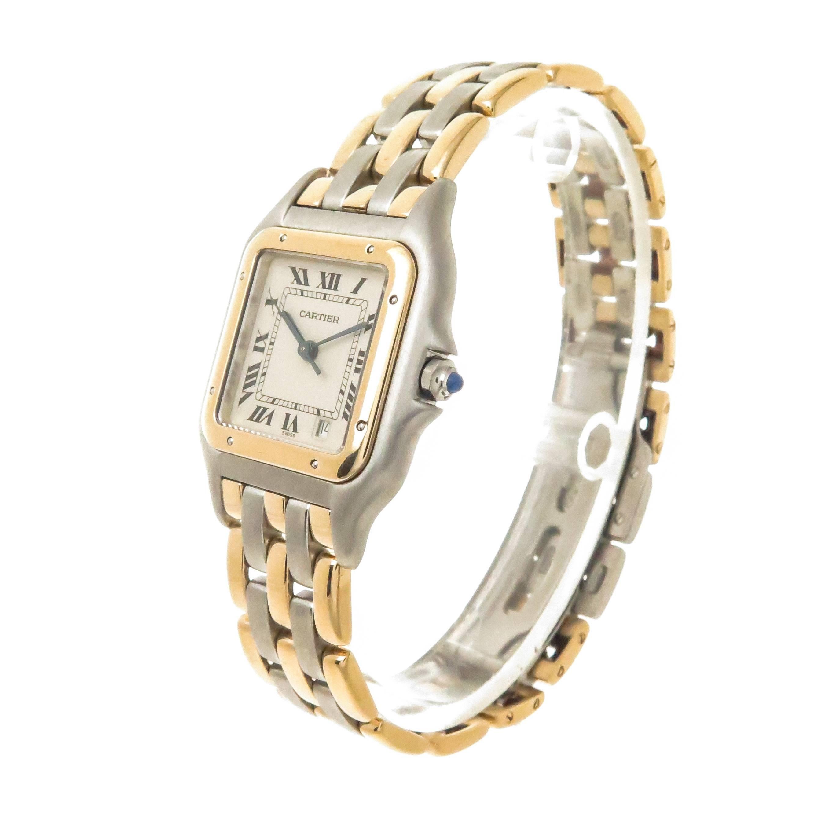 Circa 2000 Cartier Panther Collection Mid size Wrist Watch, 36 X 26 MM Stainless Steel Water resistant Case with 18K Yellow Gold Bezel, Quartz Movement, White Dial with Black Roman Numerals a Calendar window at the 5 position and a sapphire Crown.