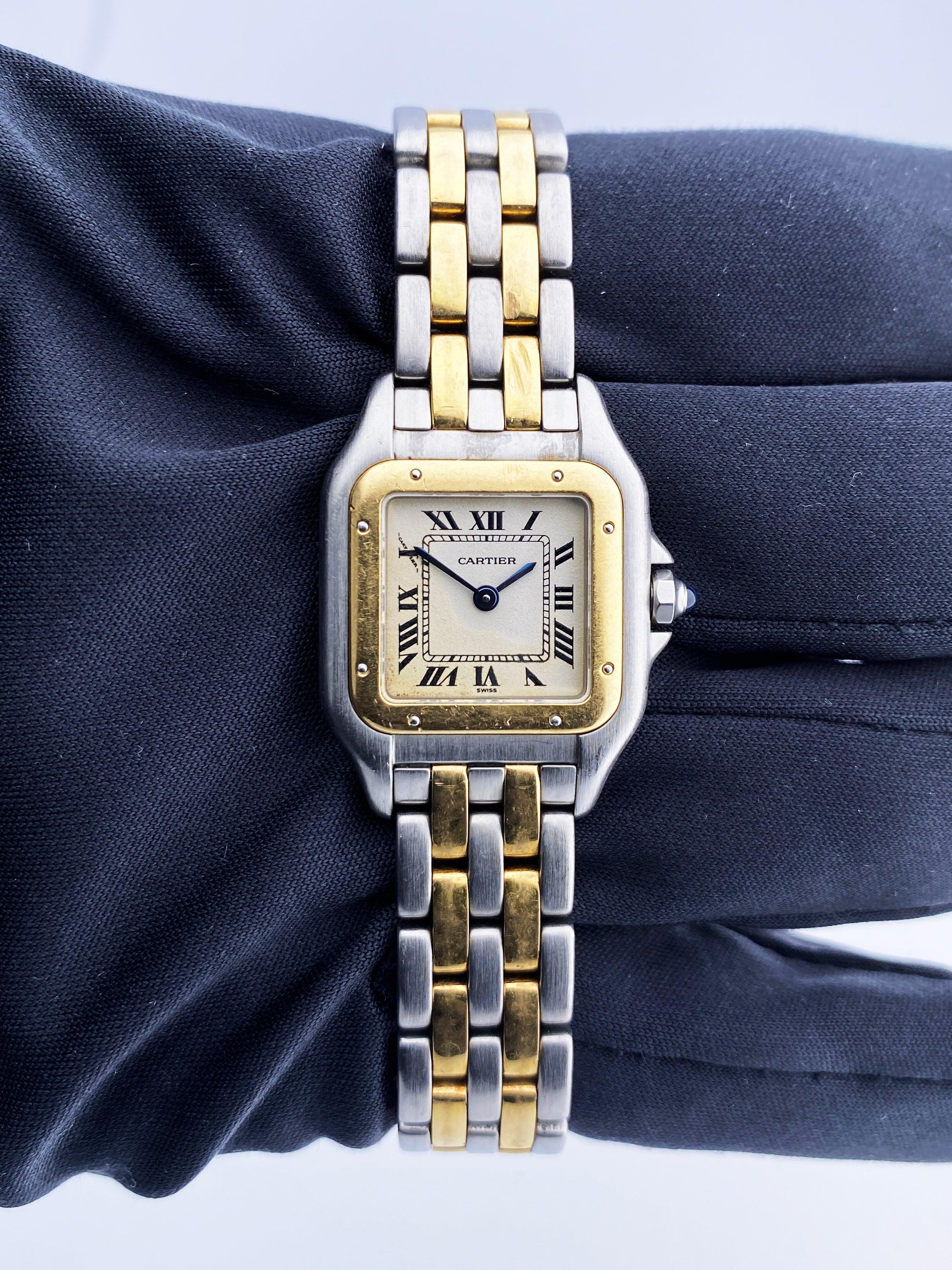 Cartier Panthere 1120 Ladies Watch. 22mm stainless steel case. 18K yellow gold bezel. Off-White dial with blue steel hands and Roman numeral hour markers. Minute markers on the inner dial. Stainless steel & two rows of 18K yellow gold  bracelet with