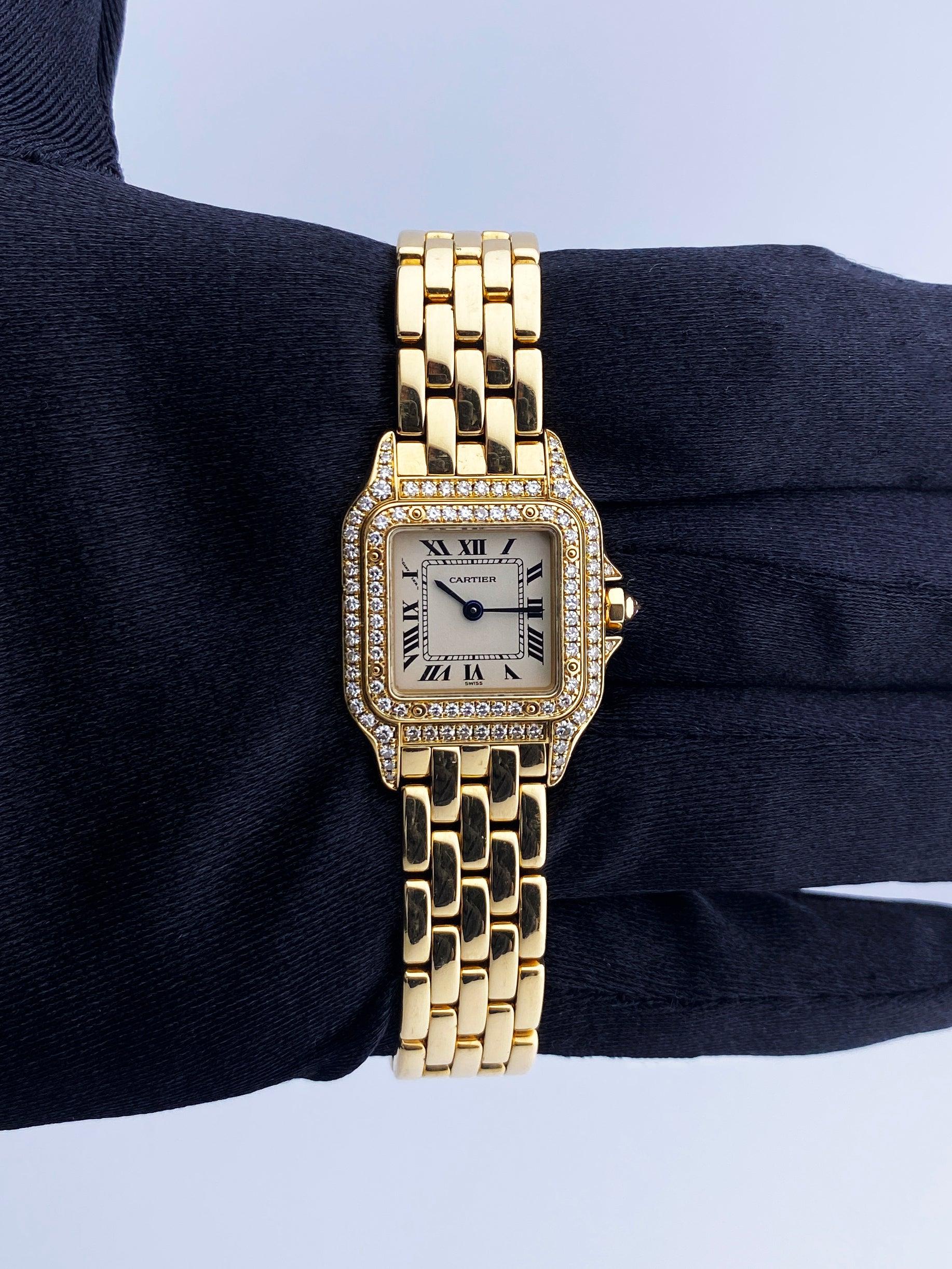 Cartier Panthere 1280 Ladies Watch. 22mm 18K yellow gold & original factory diamond set case.  18K yellow gold bezel with original factory diamond set. Off-white dial with black Roman numeral hour marker and blue hands. 18K yellow gold bracelet with