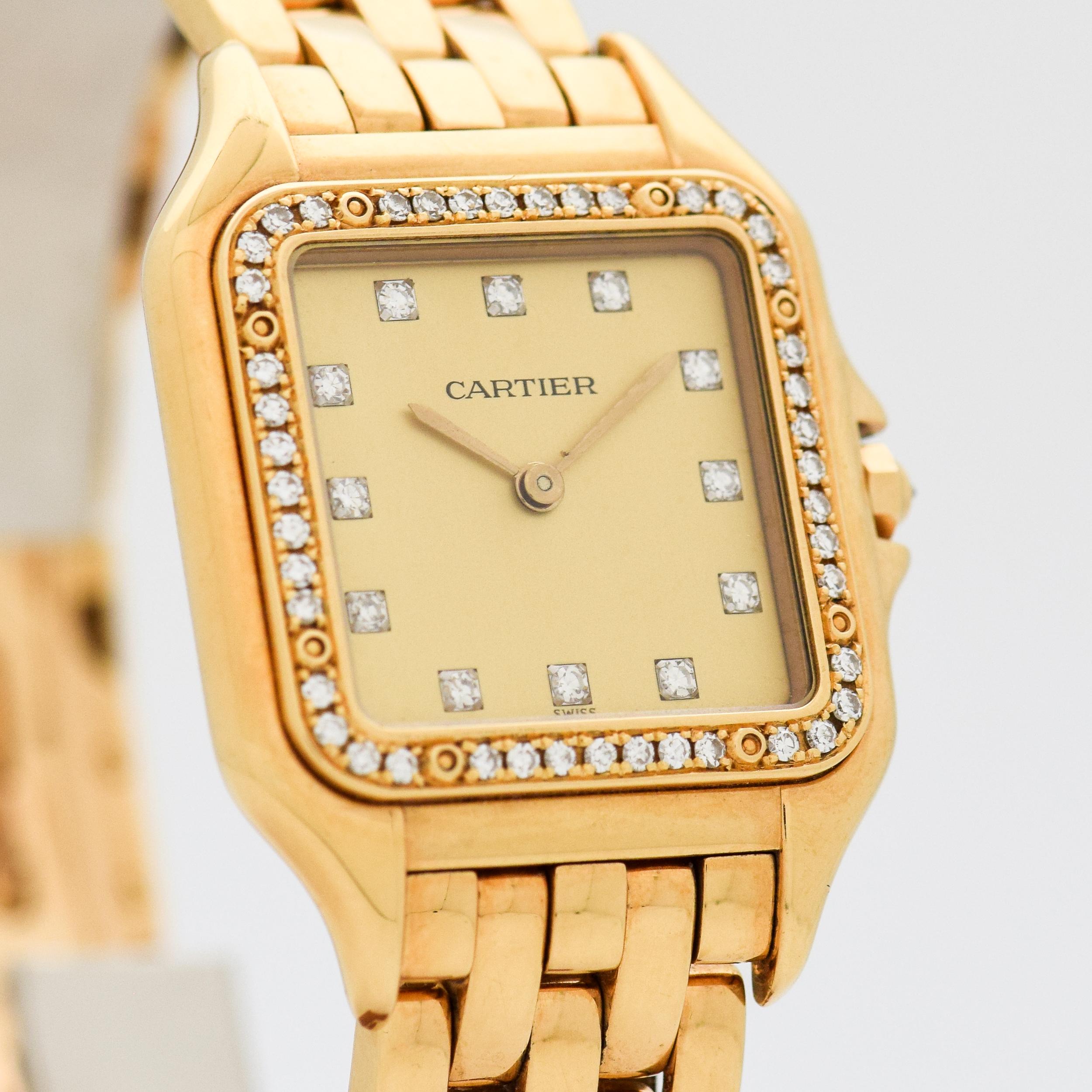 1990's era Cartier Men's Size Panthere 18k Yellow Gold with Diamond Bezel. Original Gold Color Dial with Square Diamond Markers with Original Cartier 18k Yellow Gold Bracelet. Comes with Original Box. Size: 29mm x 39mm lug to lug (1.14 in. x 1.54