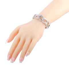 Cartier Panthere 18 Karat Gold Full Diamond Pave, Emeralds, and Onyx Link Brace