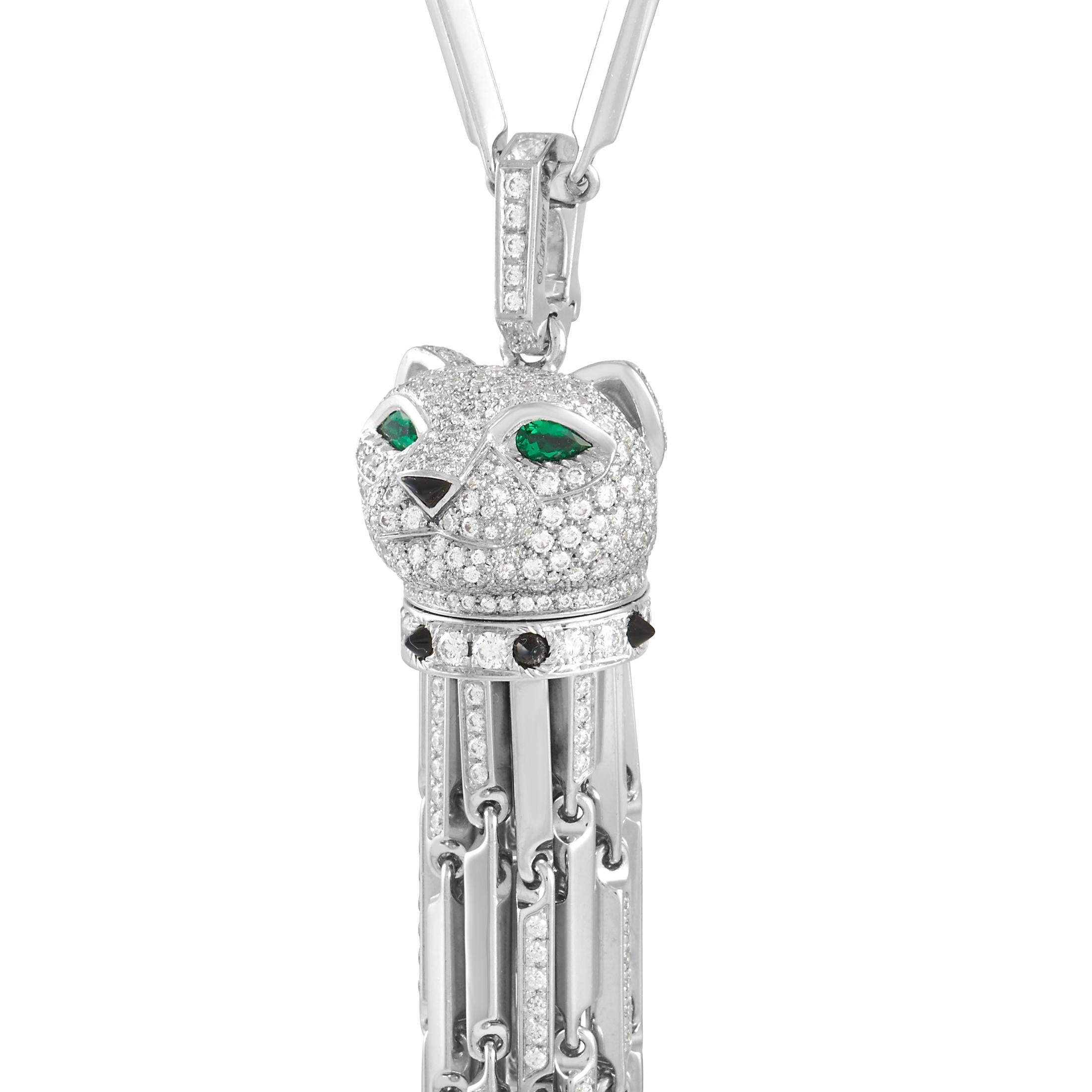 This exciting Cartier Panthere Pendant Necklace puts luxury boldly on display. Attached to a unique linked chain measuring 30” long, you’ll find a fabulous diamond-encrusted panther head with green eyes and a black studded “collar”. Chain tassels