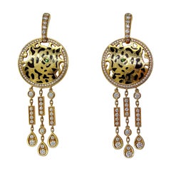 Cartier Pendentifs panthère en or jaune 18 carats et diamants