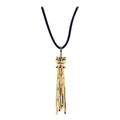 Vintage Cartier Panthere 18k Yellow Gold on a Black Cord Pendant