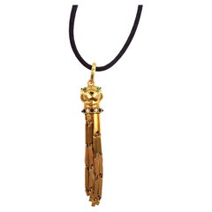 Retro Cartier Panthere 18K Yellow Gold Pendant Necklace with a Black Cord