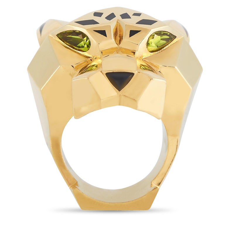 A bold panther motif makes this piece from the Cartier Panthere collection a statement-making luxury piece. Crafted from opulent 18K Yellow Gold, a 9mm wide band and 15mm top height make this charming piece impossible to ignore. 