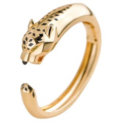 Bracelet Cartier Panthère en or jaune 18k Tsavorite et Onyx Taille 16