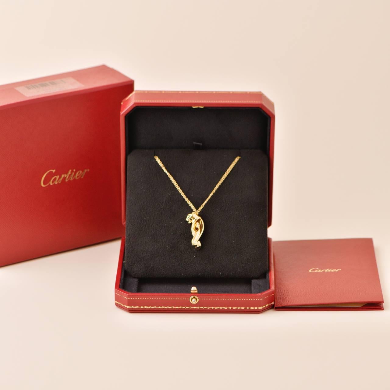 SKU	77701239
Comes With	Box Only
Date	2020
Model	B7221900
Serial Number	FX****
Metal	18k Yellow Gold
Stones	Tsavorite, Onyx
Weight	Approximately 14.55 g
Length	Approximately 45.5