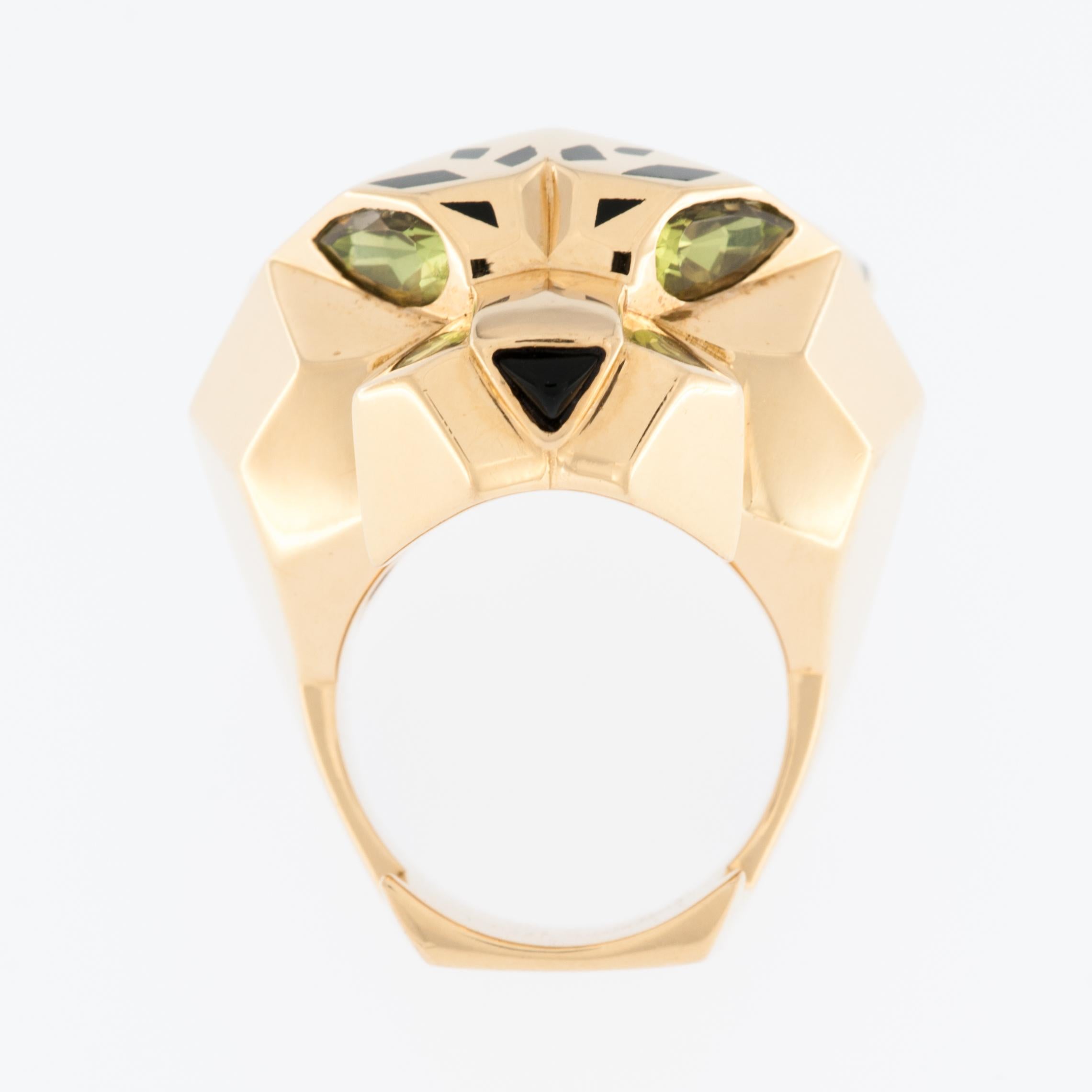 The Cartier Panthère 18kt Yellow Gold Ring is a luxurious and iconic piece of jewelry from the renowned Cartier brand. This ring features the distinctive and powerful symbol of the panther, a recurring motif in Cartier's design history.

Crafted