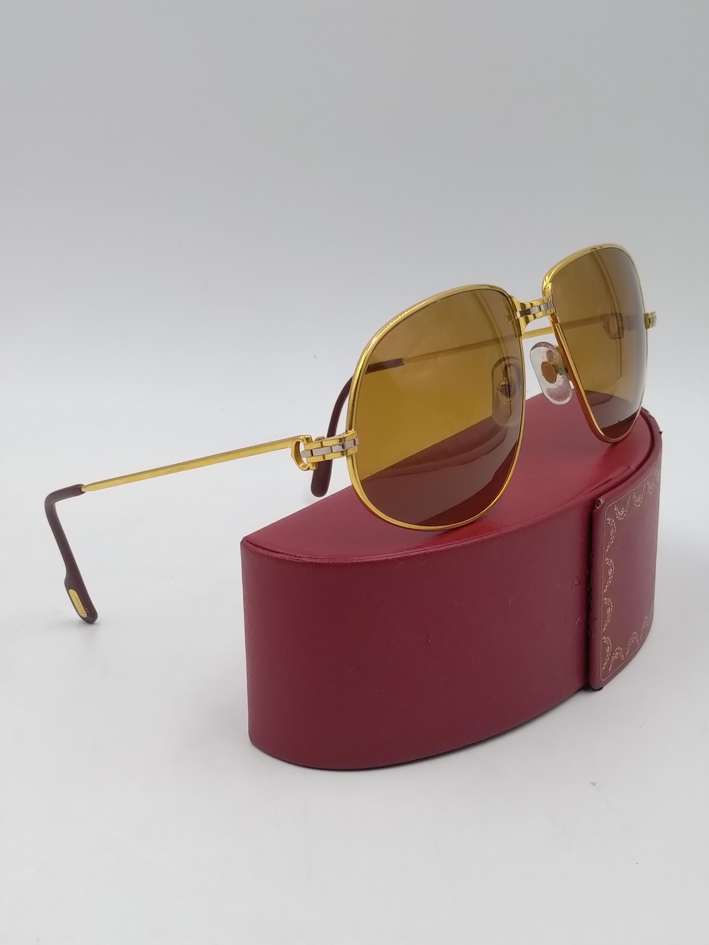Cartier Panthere 63/16 Gold Plated Sunglasses, 1988
-100% authentic Cartier
- Size 63-16 / 140 (large size)
- Brown lenses
- Serial Number E 040230