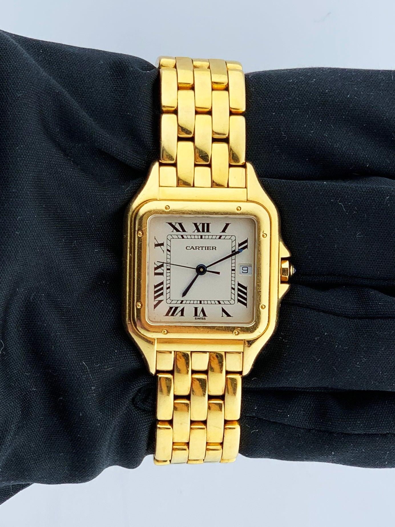Cartier Panthere 883968 Large Mens Watch. 29mm 18K yellow gold case with 18K yellow gold smooth bezel. Off-White dial with Blue steel hands and black Roman numeral hour markers. Minute markers on the inner dial. Date display at the 3 o'clock