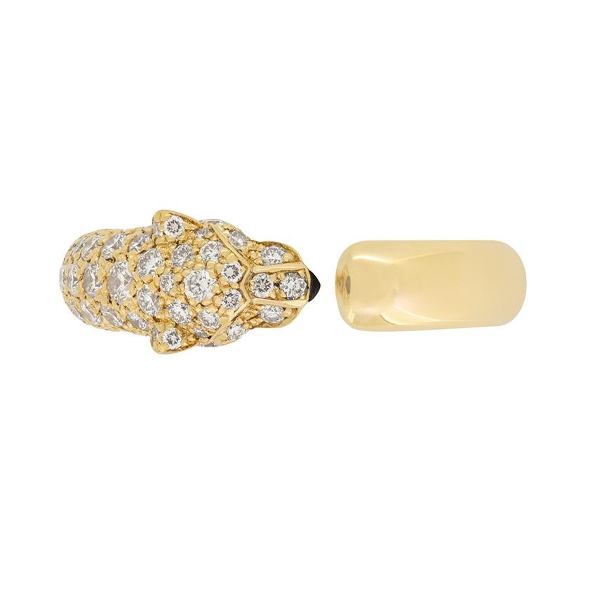 From the designer Cartier comes this stunning Panthère De Cartier ring. From their Panthère collection this ring takes on the likeness of a leopards head grain set with a total of 0.68 carat round brilliant diamonds . The diamonds are of high