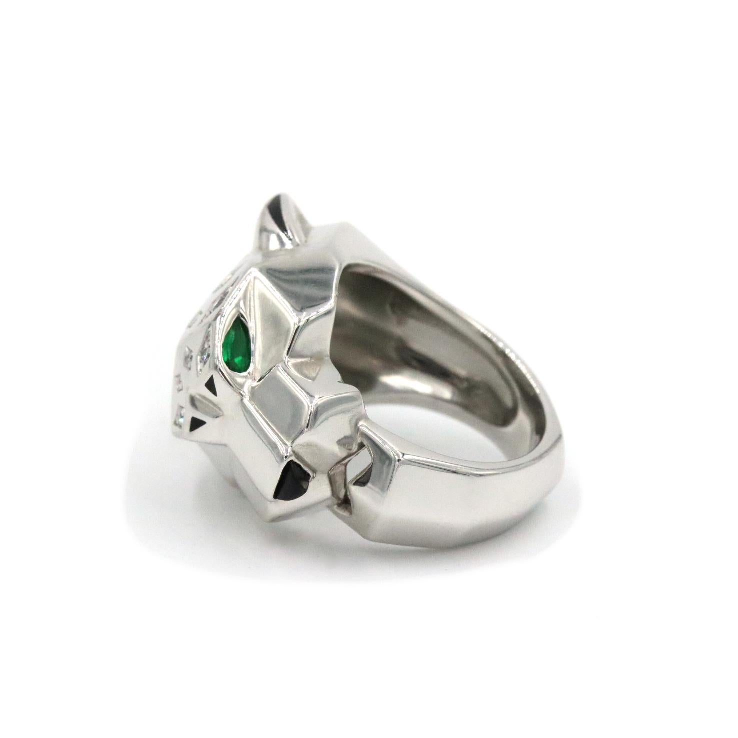 Cartier Panthere De Cartier 18K White Gold Ring. This Ring Features A Panther Shaped Head With Emerald Eyes, Diamond Spots And Onyx Ears And Nose. The Ring Comes With Original Box And Service Papers. SN.97043B

Measures Approx .71