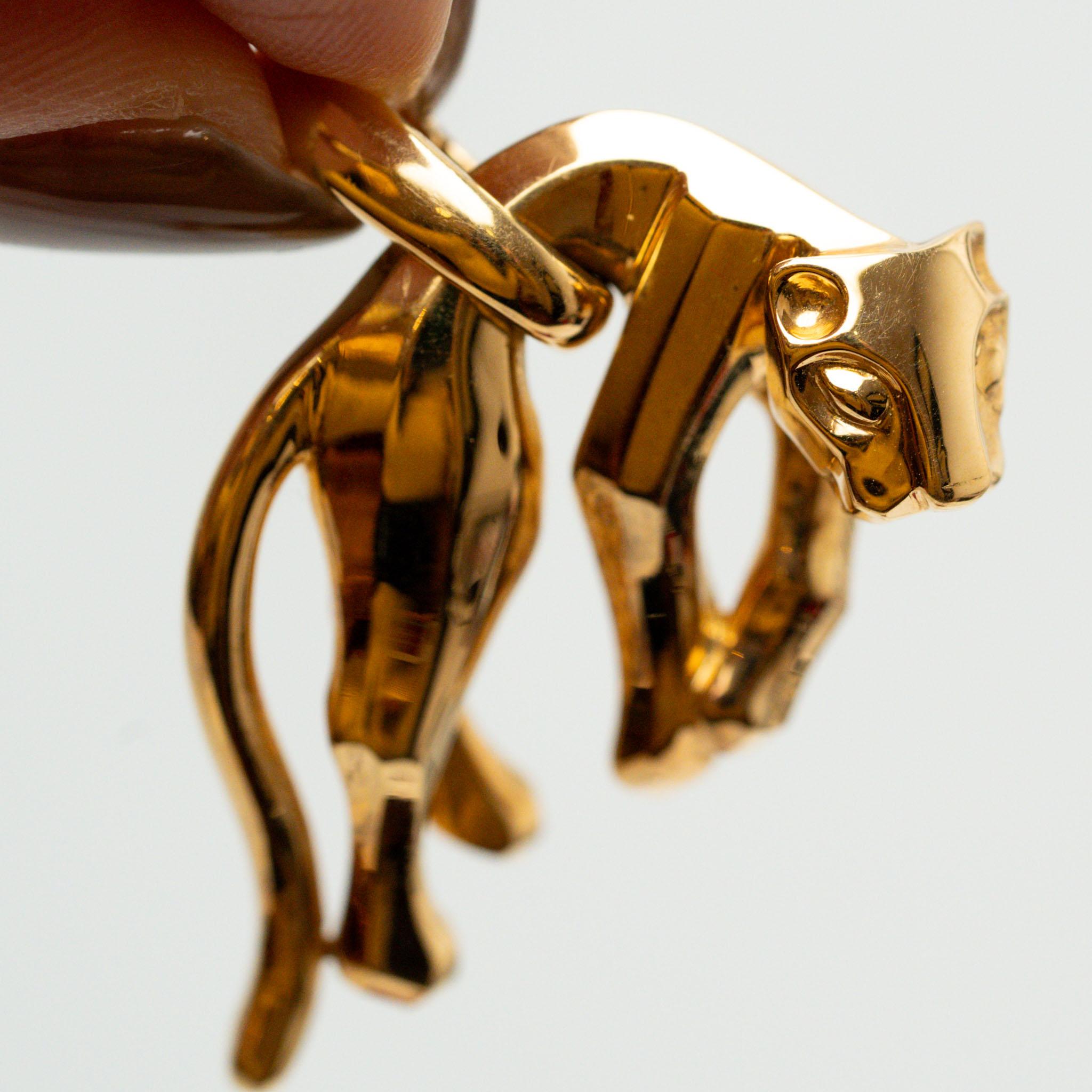 Cartier Panthère de Cartier Pendant 18k Yellow Gold 2002 Full Set
SKU: 1648

A striking embodiment of Cartier’s most iconic symbol, this Panthère de Cartier Pendant from 2002 captures the maison’s timeless fusion of power and elegance.

Expertly