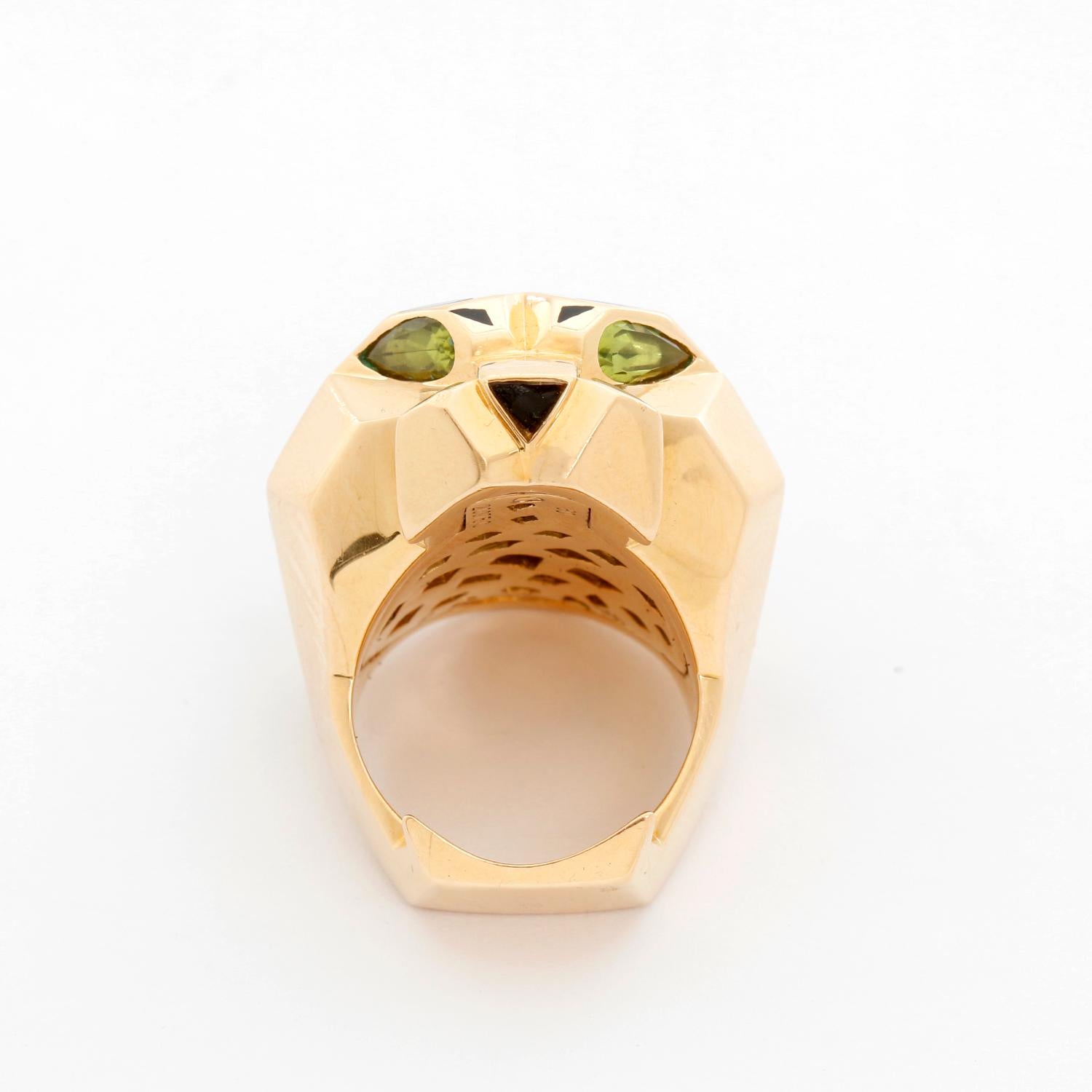 Cartier Panthere De Cartier Ring Size 9 - 18K Yellow gold ring in the shape of an open mouth panther with black Lacquer spots, Peridot eyes, and a black Onyx nose. . Pre-owned with box and papers.