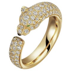 Used Cartier Panthère de Cartier ring, yellow gold onyx with 2 emerald