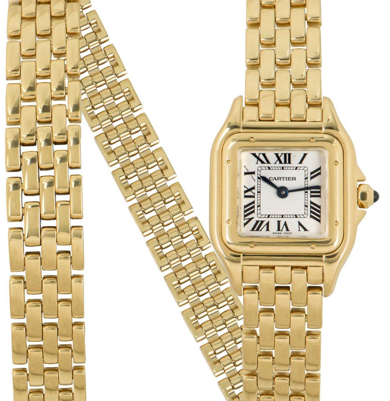 A stunning Cartier ladies wristwatch in yellow gold. Featuring a silver dial with roman numerals, blued steel sword shaped hands, Cartier's own hidden signature at 'X' and a crown set with a single cabochon.

Fitted with a scratch resistant sapphire