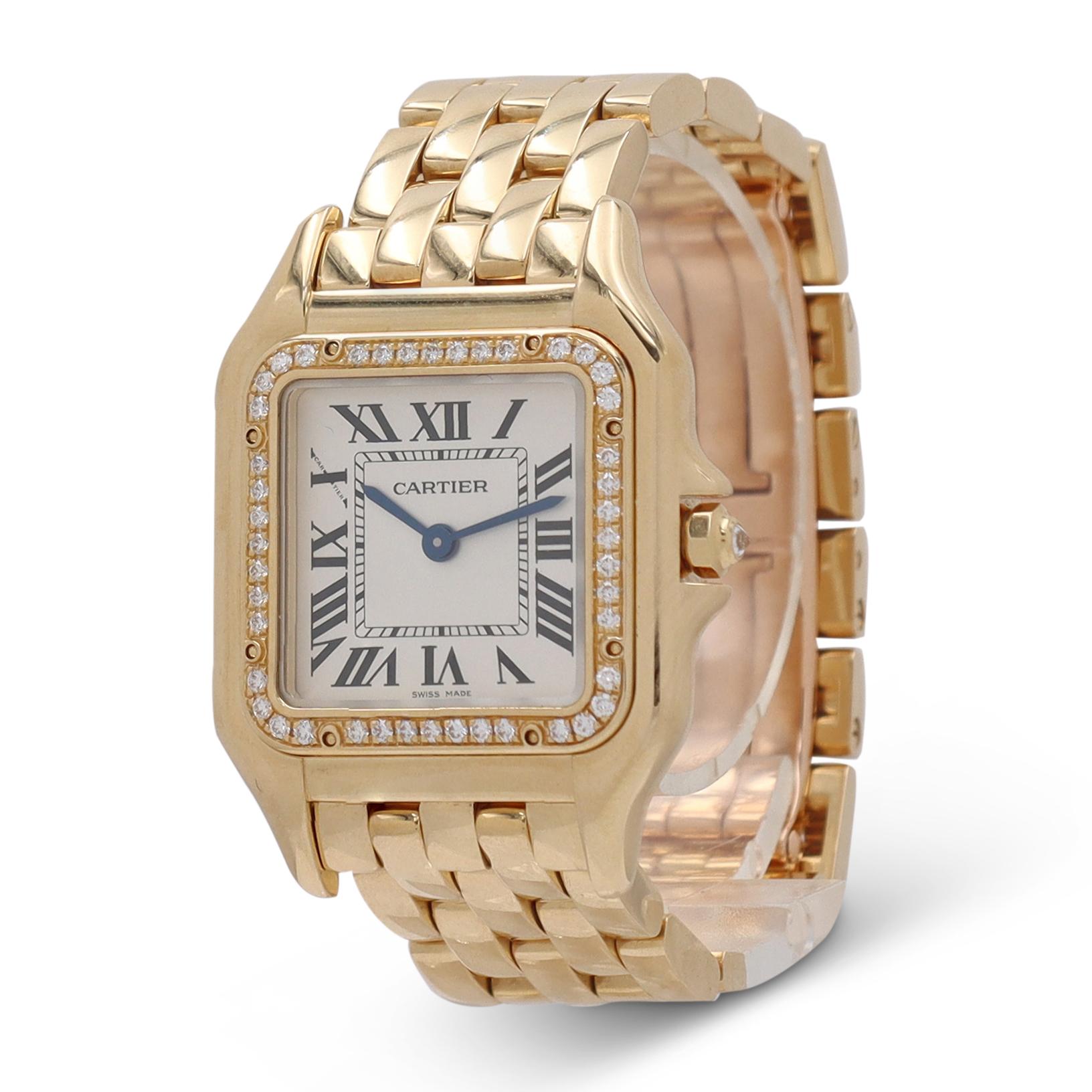 Authentic Cartier 'Panthère' ladies watch crafted in 18 karat yellow gold.  The case measures  27mm x 37mm with original diamond bezel and diamond-set crown, silvered dial, blue steel sword-shaped hands, and Roman Numeral hour markers.  The 18 karat