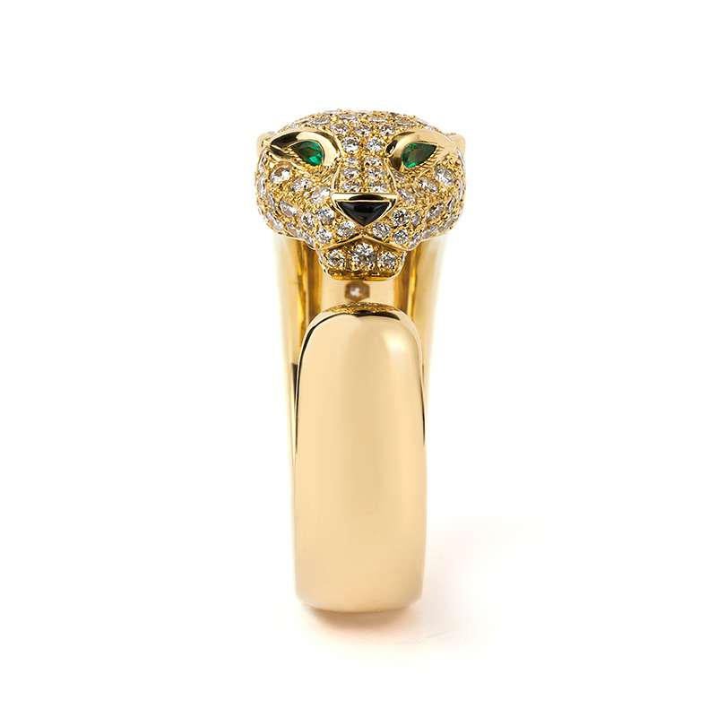 Panthere de Cartier ring in 18K yellow gold, set with 137 brilliant-cut diamonds totaling 1.15 carats. Emeralds, onyx.

This item will come with an original box and warranty
Size EU51 US5.75
Weight: 13.2g
Re: N4225000
Stock#: CTR283