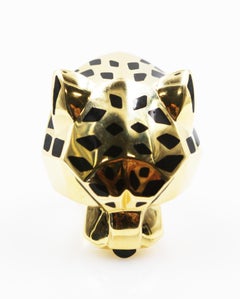 Bague Panthère de Cartier en or jaune laqué Peridots Onyx