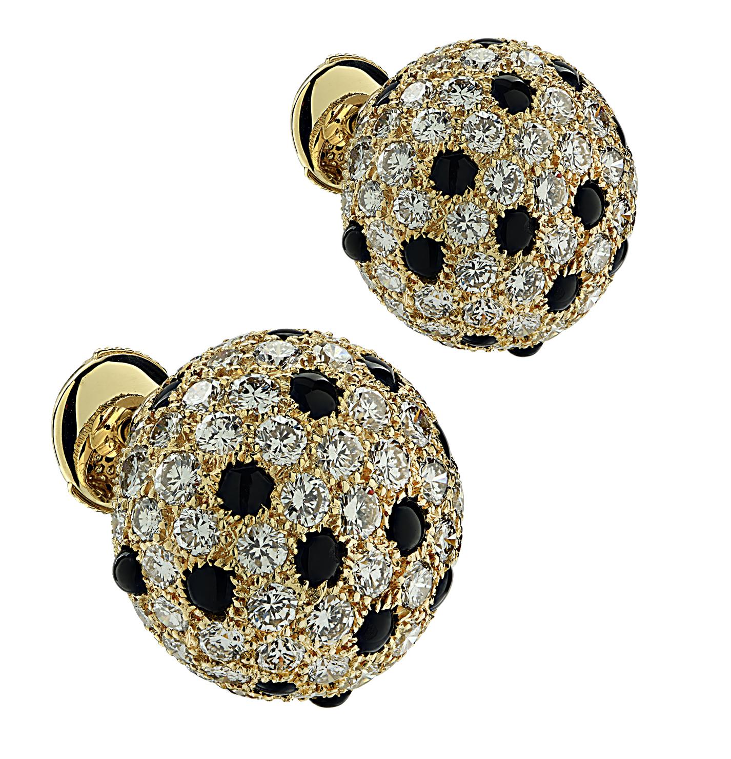 From the House of Cartier, these striking Cartier Panthere bombe stud earrings are crafted in 18 karat yellow gold, and feature round brilliant cut diamonds weighing approximately 4.64 carats total, D-E color, VVS clarity. Round onyx cabachons