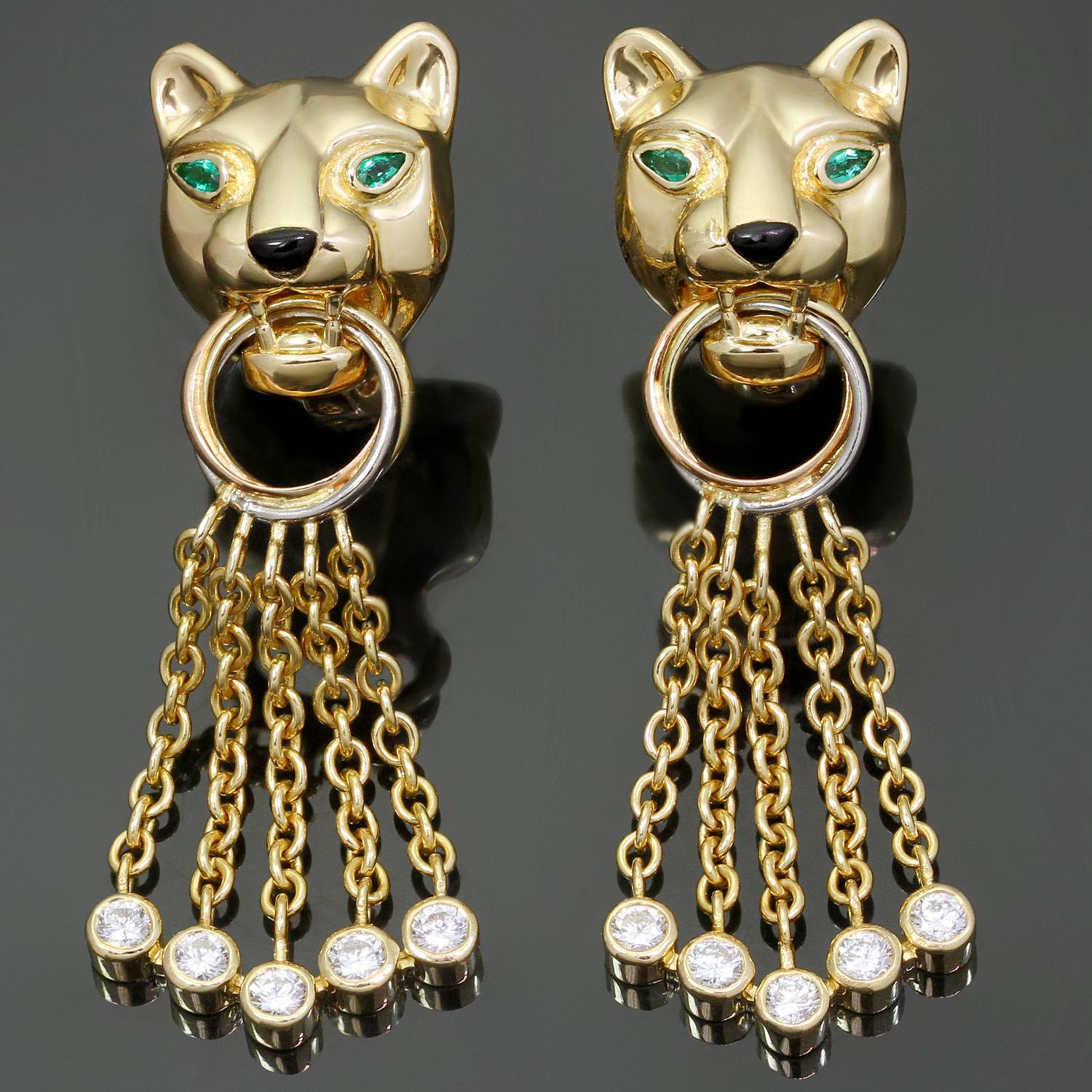 These iconic Panthère de Cartier clip-on drop earrings feature the classic panther design crafted in 18k yellow gold and accented with green emerald eyes and black lacquer nose and set brilliant-cut round D-F VVS1-VVS2 diamonds. Made in France circa