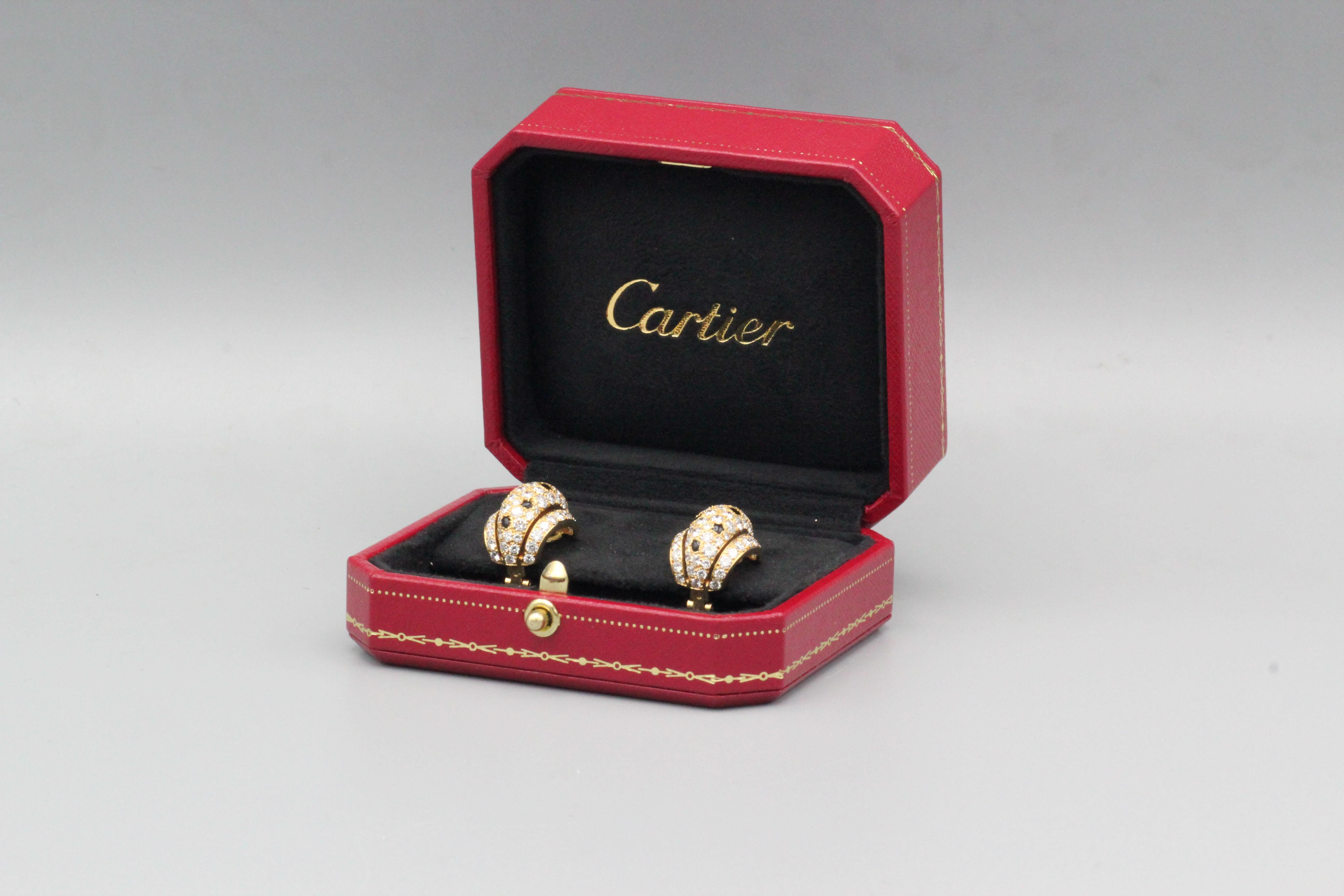 Very fine and rare diamond, black onyx and 18K yellow gold earrings from the 