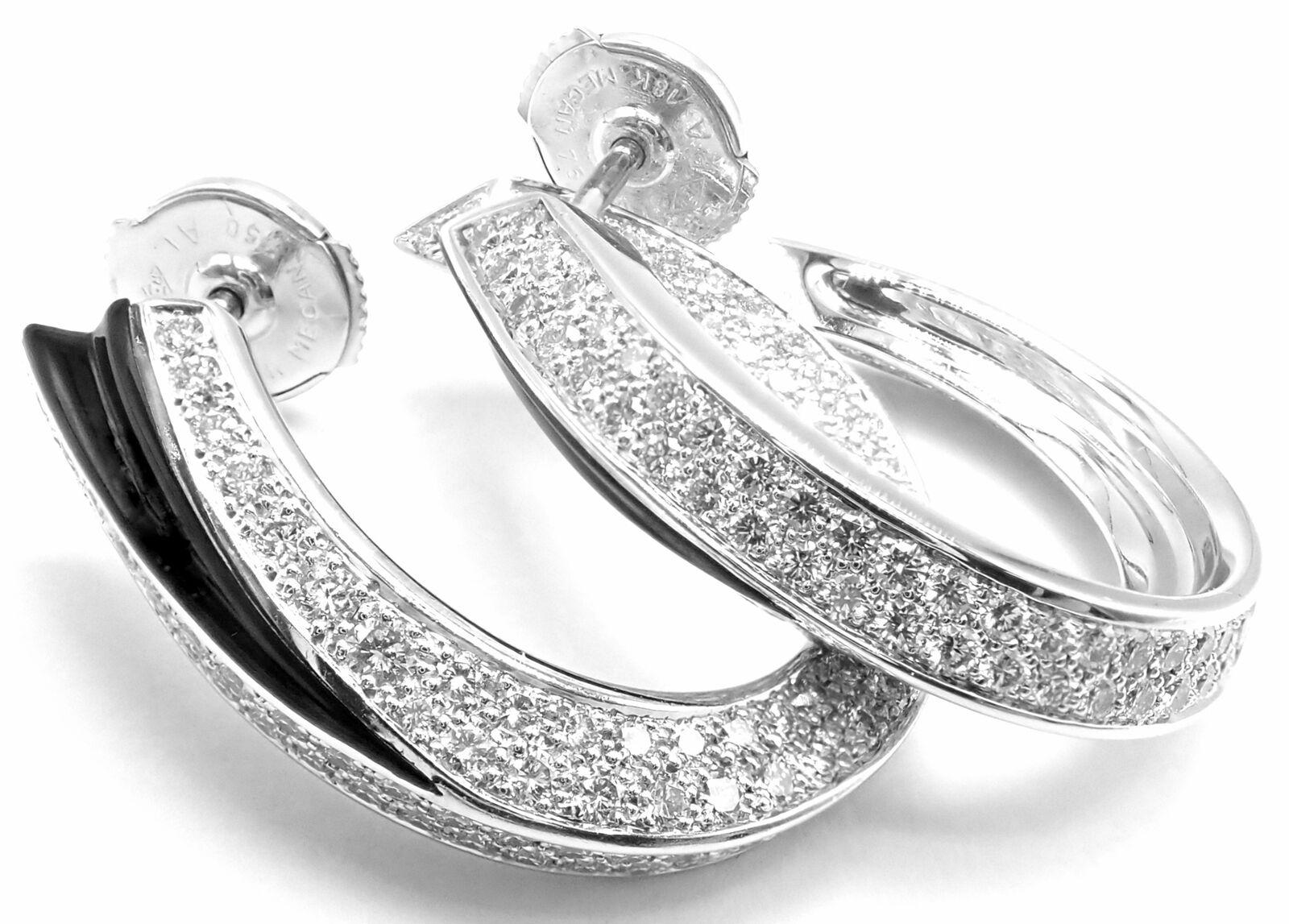 18k White Gold Panthere Diamond And Onyx Hoop Earrings by Cartier. 
With Round Brilliant Cut Diamonds VVS1 clarity, E color total weight approximately 5ct
***Earrings are made for pierced ears
Details:
Measurements: 26mm x 23mm
Weight: 12.9