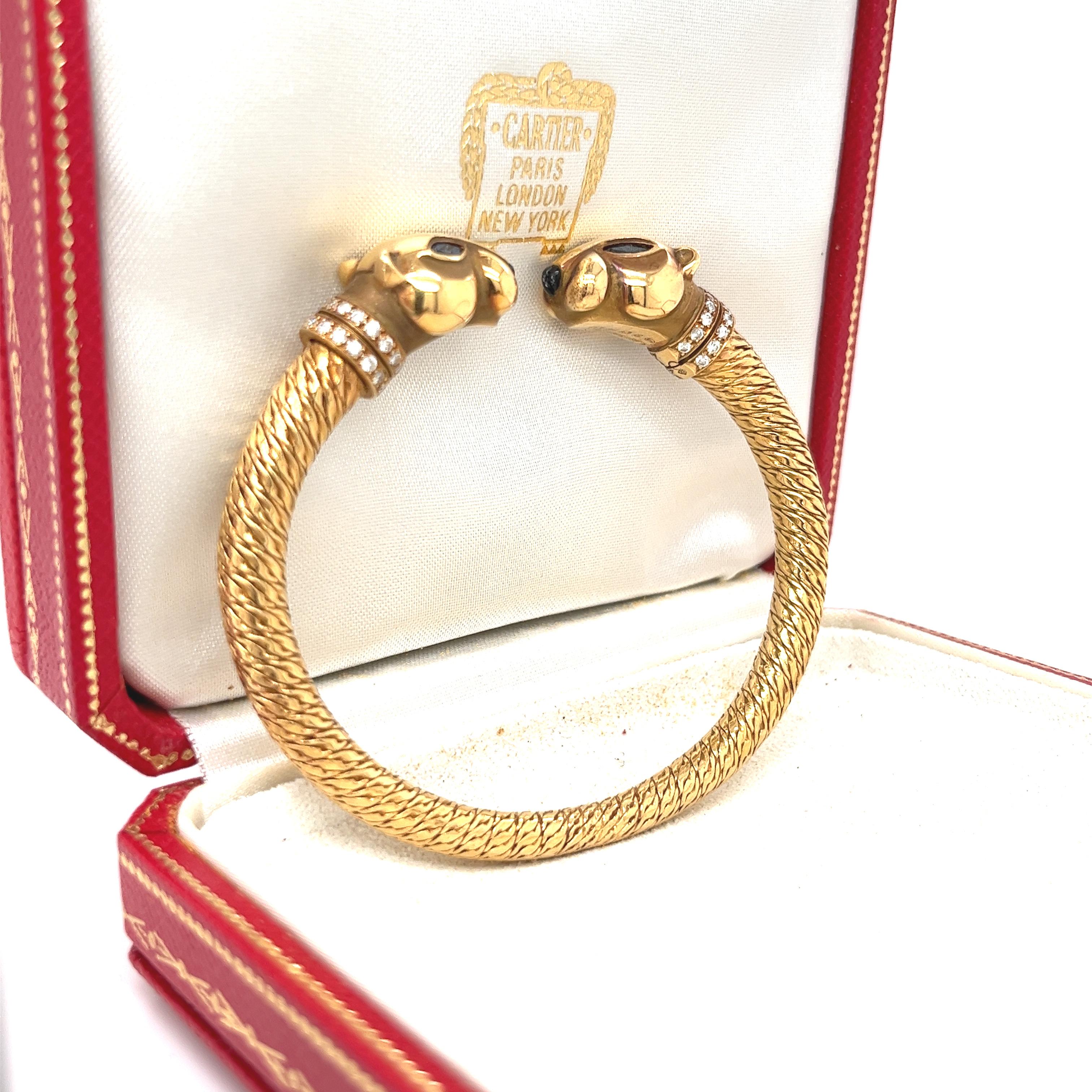 Cartier Panthère Double Headed 18K Gold Bangle with Original Box Papers In Good Condition In Miami, FL