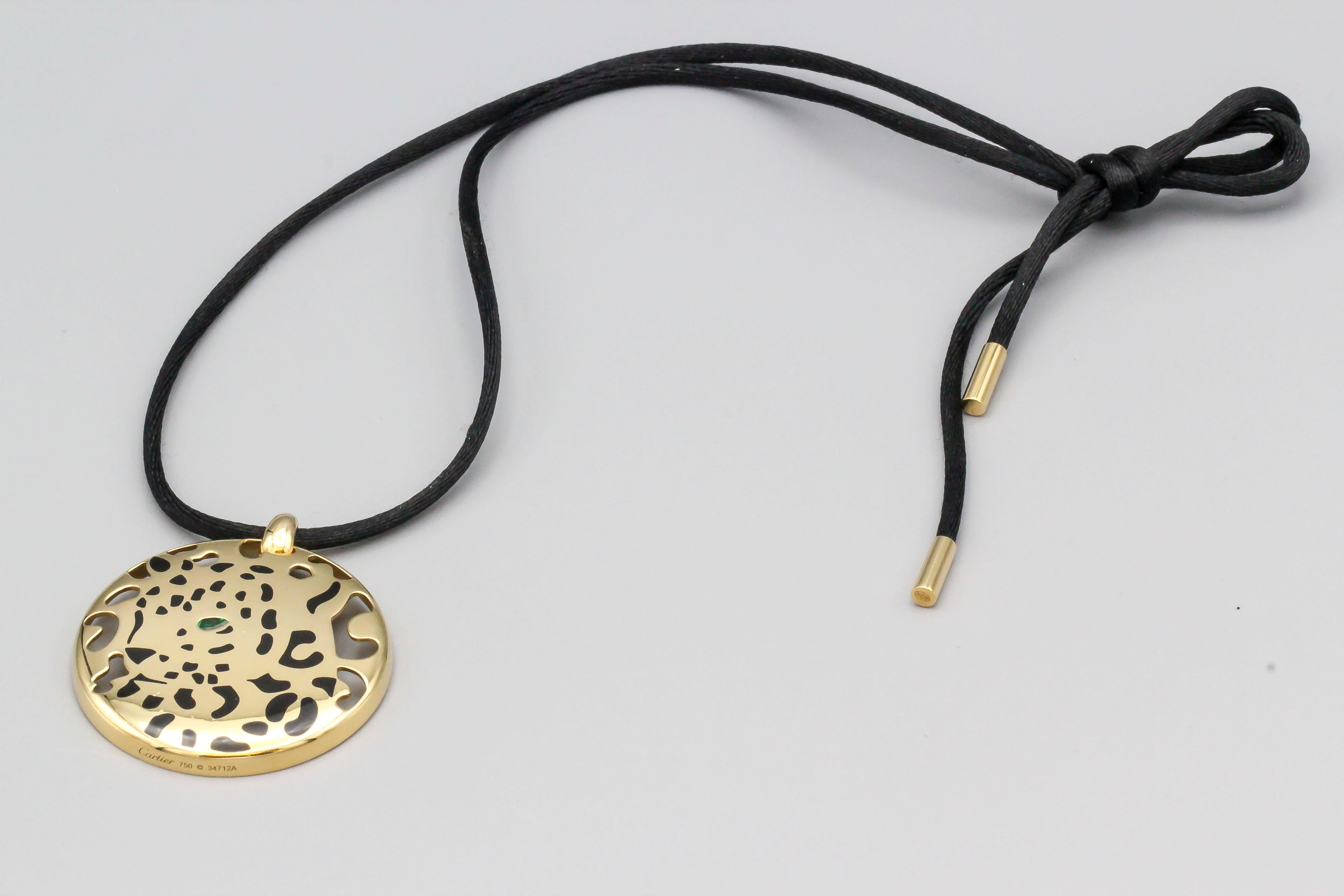 Interesting emerald, black lacquer and 18K yellow gold pendant necklace from the 