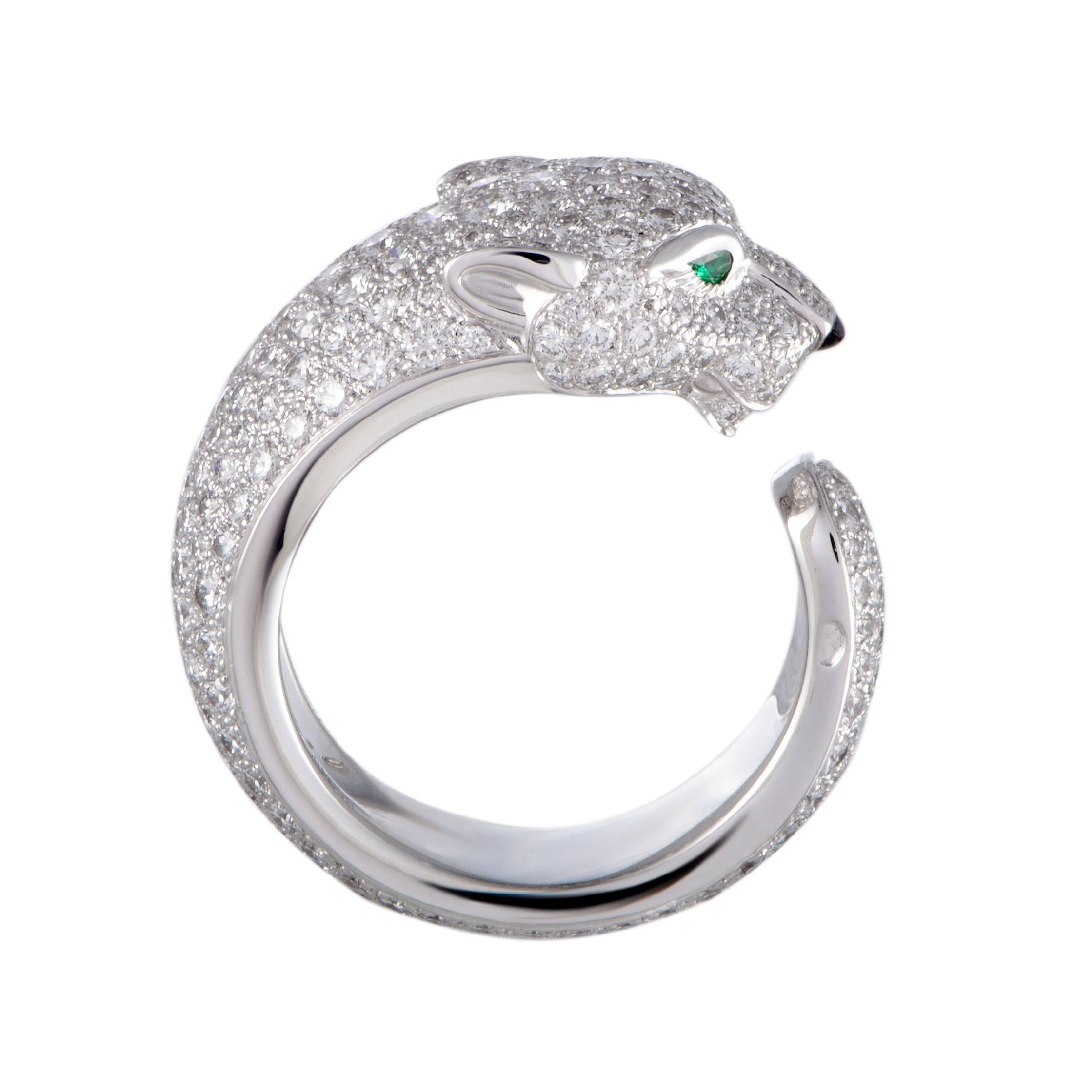 Presenting Cartier's famous motif of a panther in a stunningly extravagant manner, this fascinating ring boasts an endearingly fashionable appeal. The ring is made of 18K white gold and set with emerald, onyx, and 2.39 carats of diamond stones.
Ring
