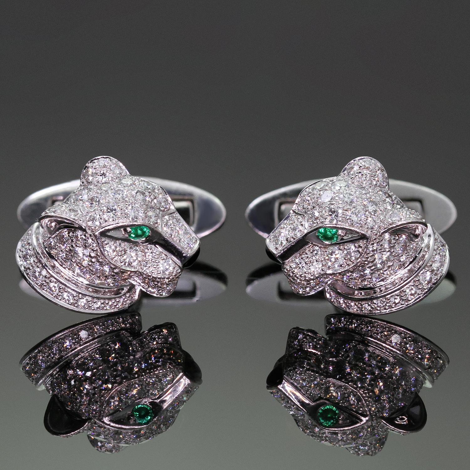 These gorgeous authentic Cartier cufflinks  feature a panther head design crafted in 18k white gold and fully pave-set with round brilliant D-E-F VVS1-VVS2 diamonds, accented with green emerald eyes and black onyx noses. Made in France circa 2000s.