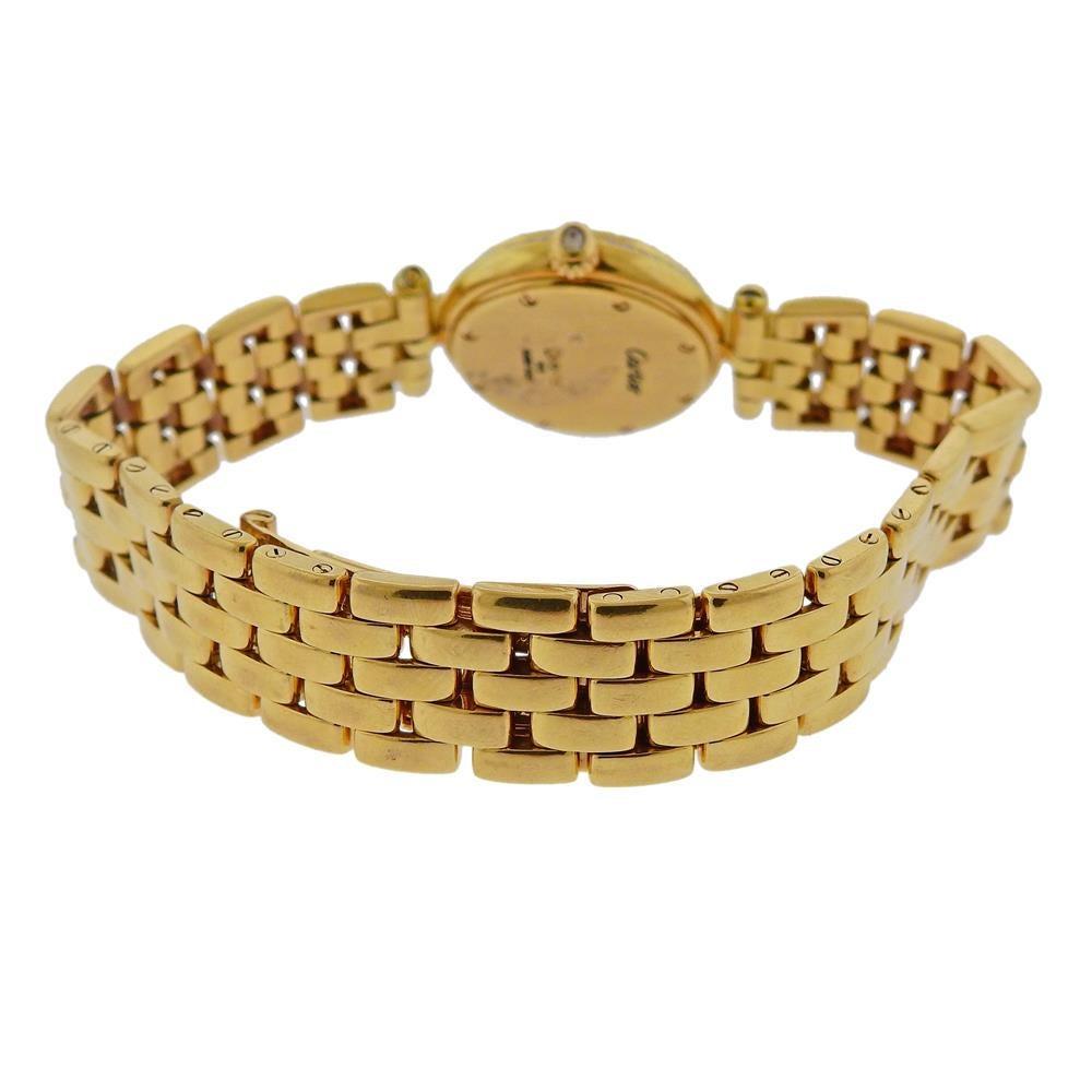 18k yellow gold Panthere lady's watch by Cartier. Case measures 23mm in diameter excl crown, bezel decorated with approx. 0.40ctw in diamonds. Cartier 5 row panthere bracelet will fit approx. 7.25