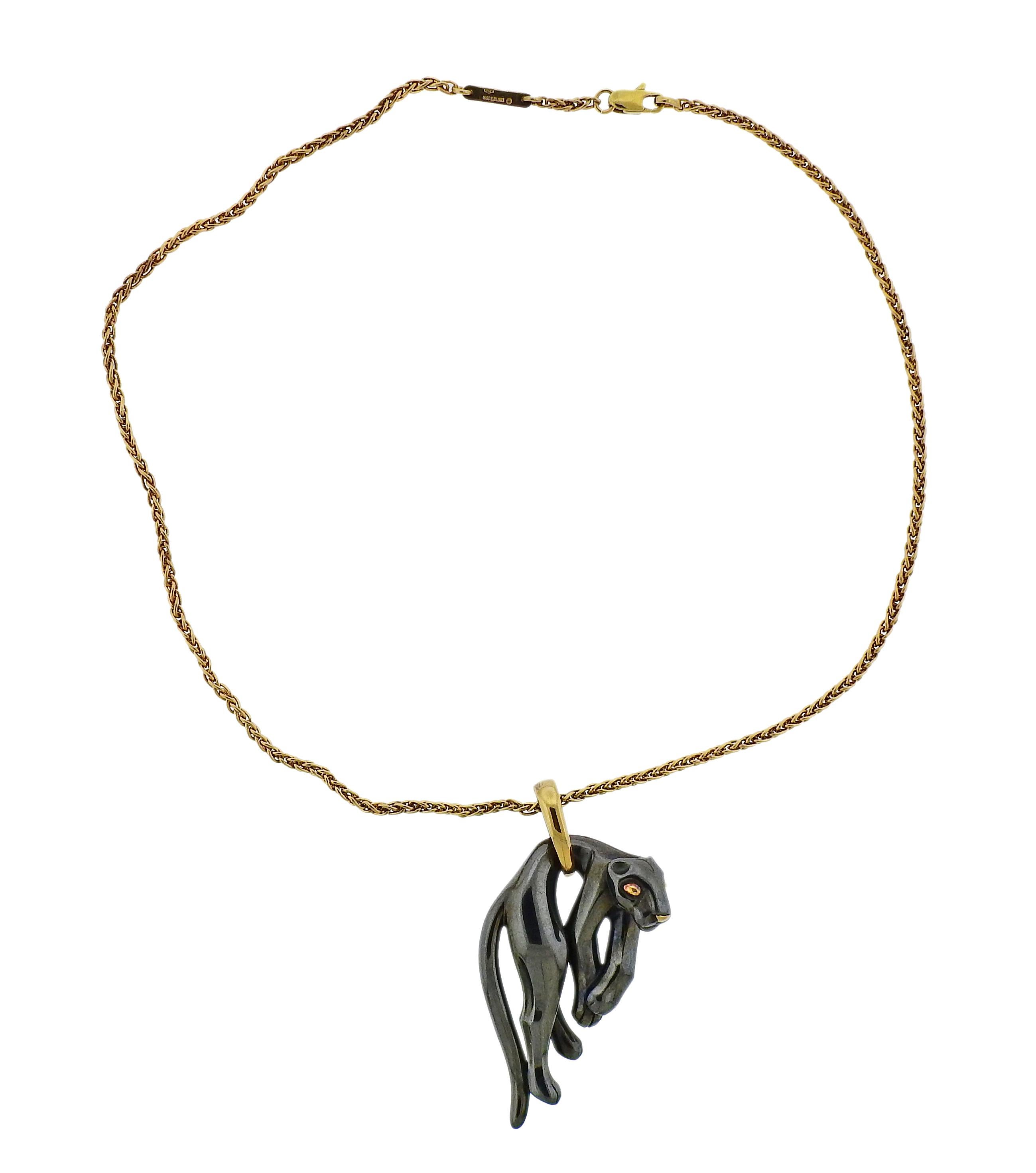 Iconic panther large pendant, crafted by Cartier, set in silver and 18k gold, suspended on a Cartier chain. Weight is 38.8 grams. Marked: Cartier, 295895, French marks, 850, 1991, 750.