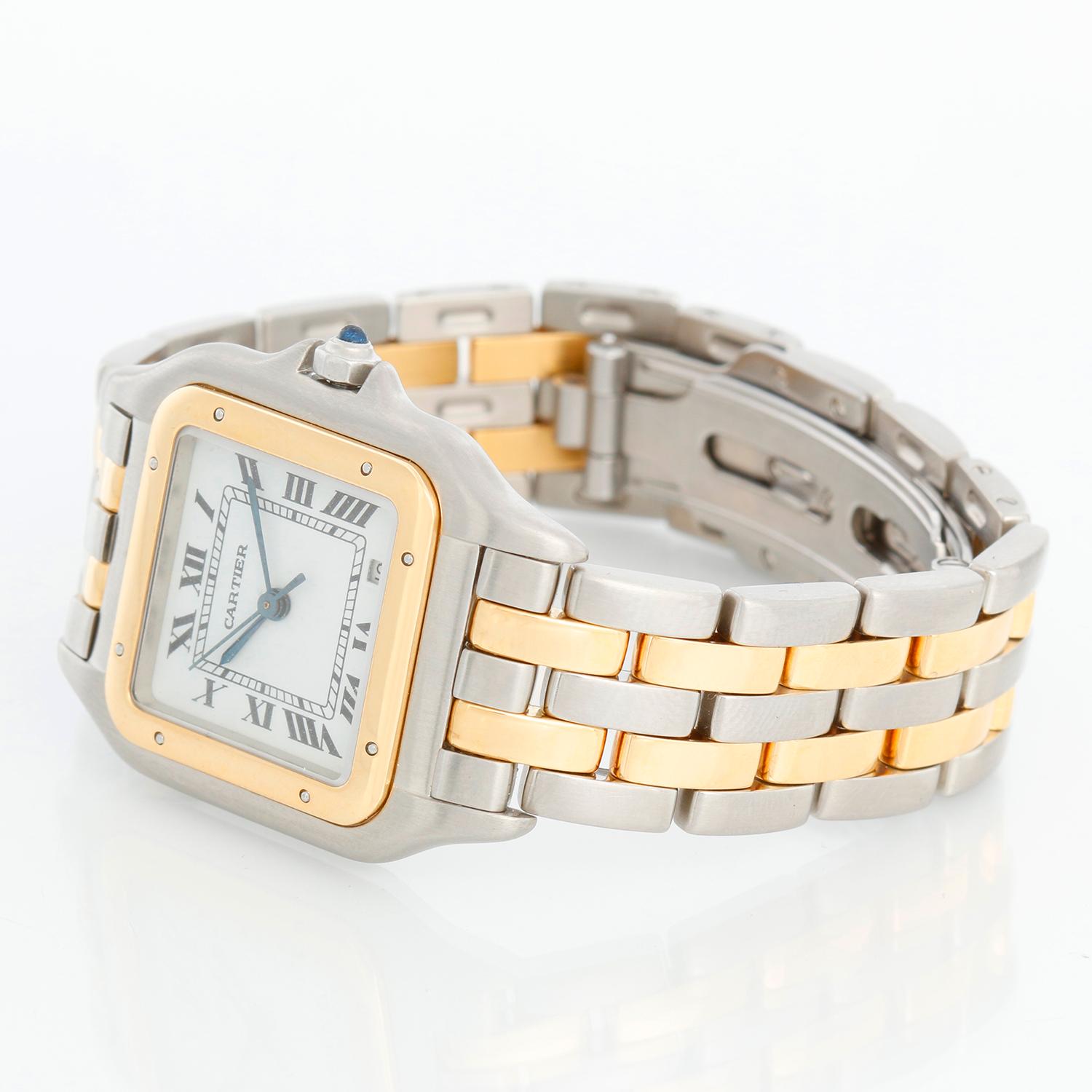 Cartier 2-Row Panther 2-Tone Steel & Gold Watch - Quartz. Stainless steel case with 18k yellow gold bezel (27mm x 37mm). Ivory colored dial with black Roman numerals and date at 5 o'clock. Stainless steel and 18k yellow 2-row Cartier Panther