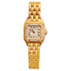 Montre-bracelet pour femme Cartier Panthere en or 18 carats avec lunette en diamants Cartier