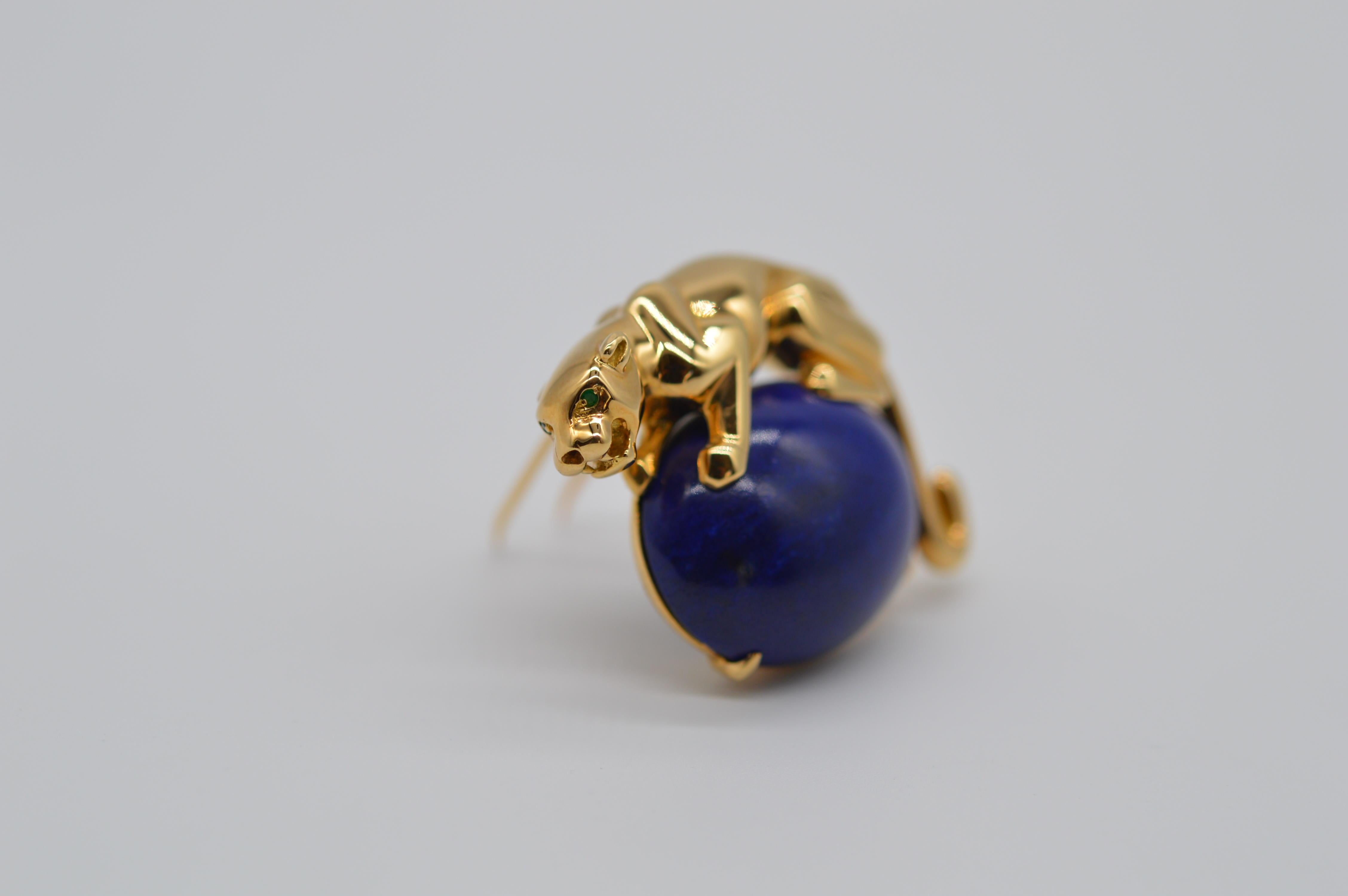 Cartier Panthère Lapis Lazuli Brooch
18K Yellow Gold
Weight 28.6 grams
Emerald Eyes
Vintage unworn condition
With original certificate from Cartier
From 1995
