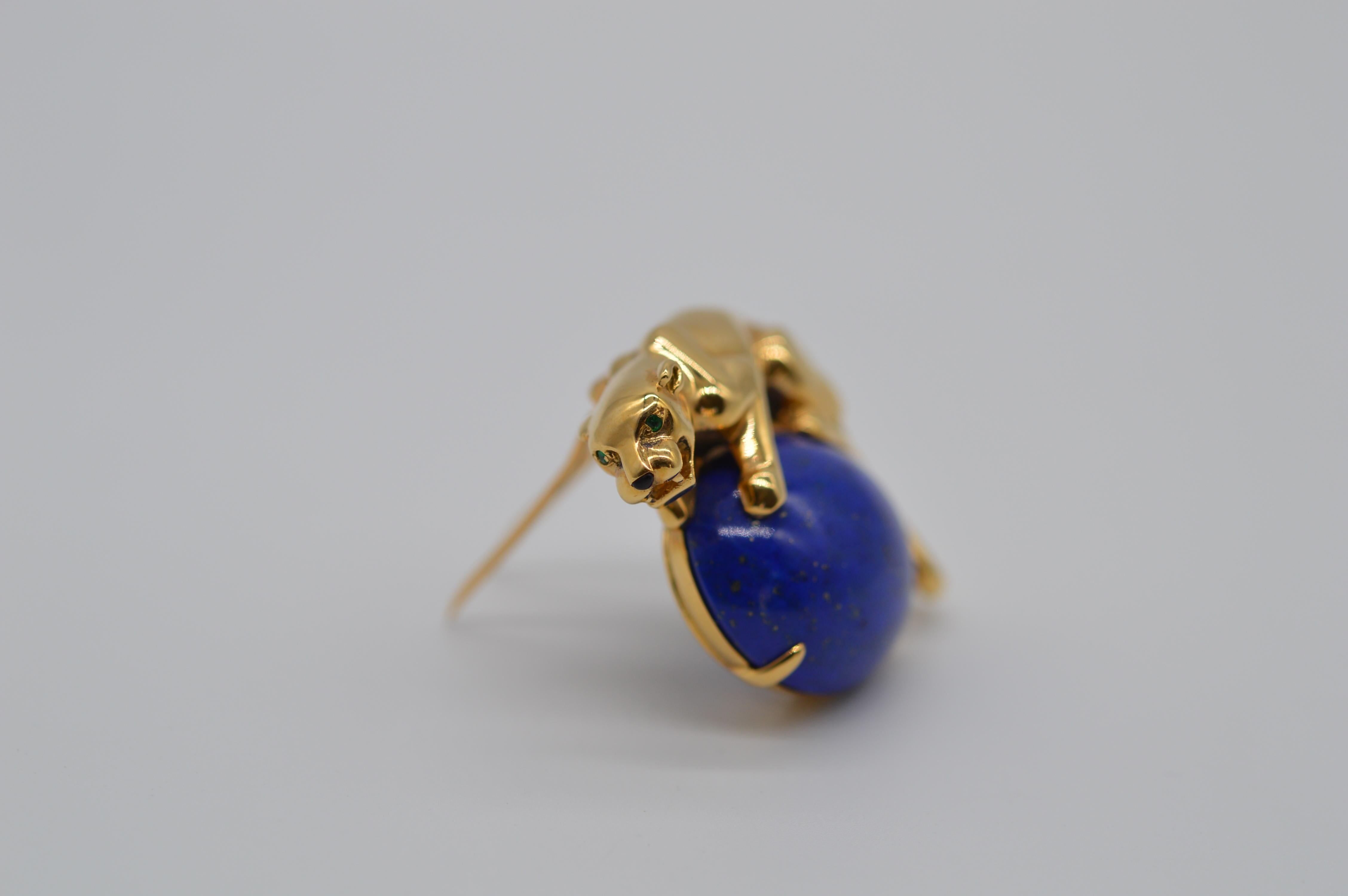 Cartier Panthère Lapis Lazuli Brooch
18K Yellow Gold
Weight 30 grams
Emerald Eye
Vintage unworn condition
With original certificate from Cartier
From 1995