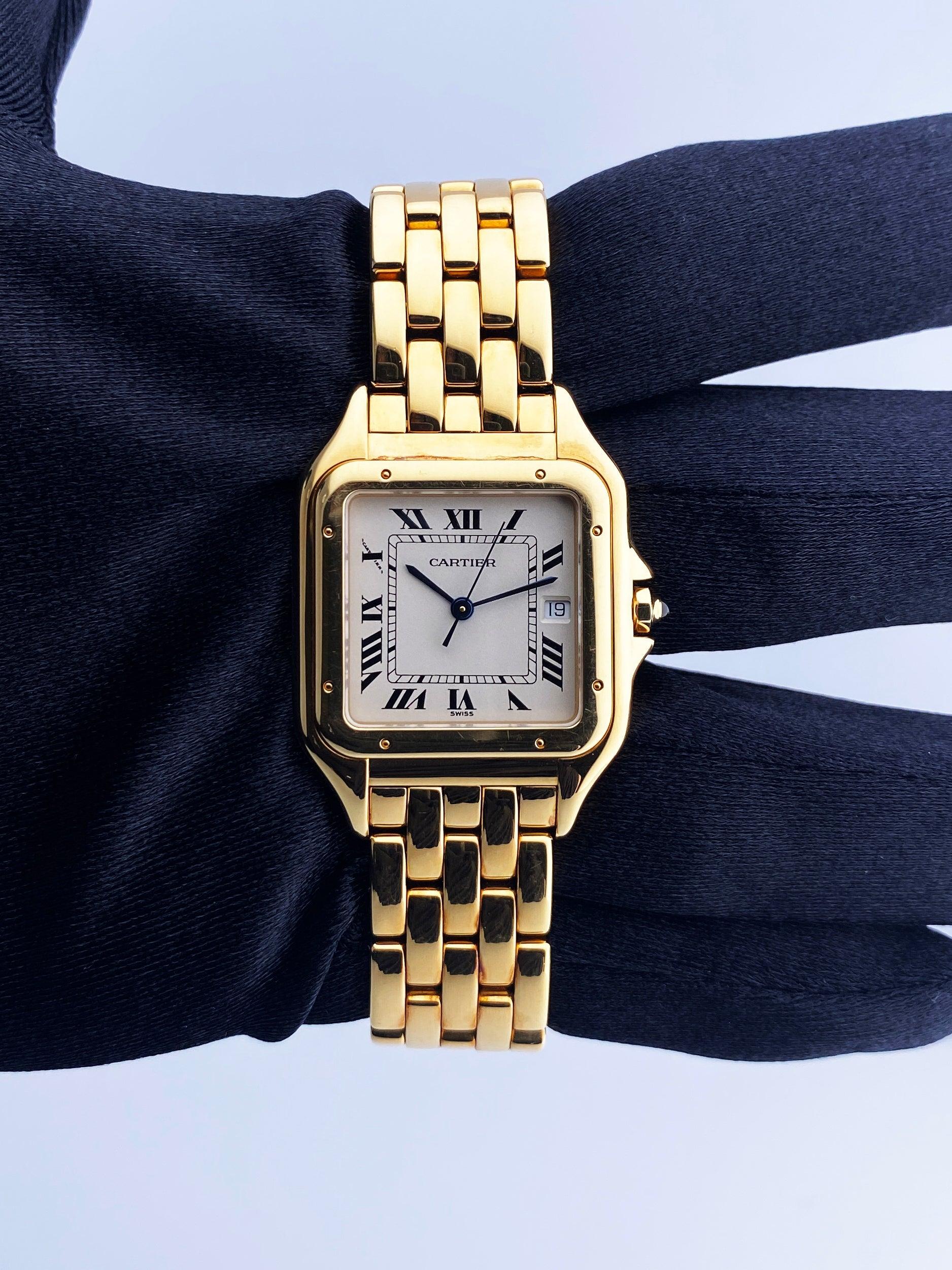 Cartier Panthere Large Mens Watch. 29mm 18K yellow gold case with 18K yellow gold smooth bezel. Off-White dial with blue steel hands and black Roman numeral hour markers. Minute markers on the inner dial. Date display at the 3 o'clock position. 18k