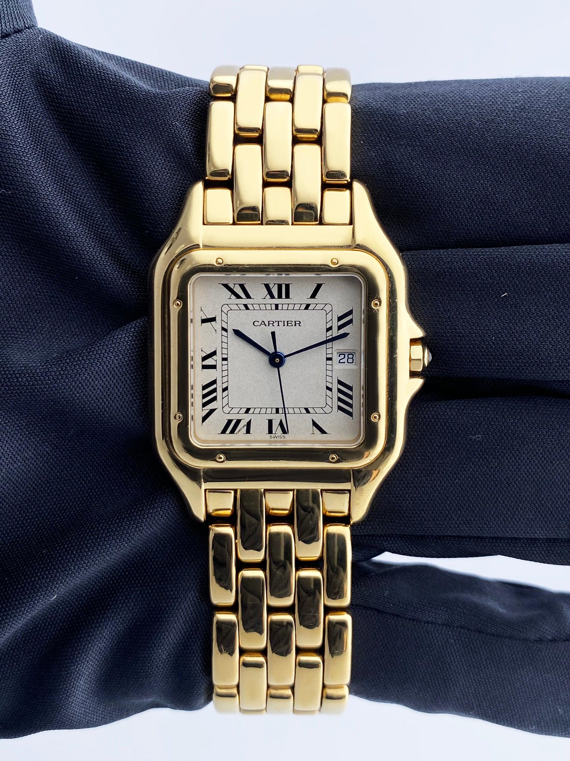 Cartier Panthere Large Mens Watch. 29mm 18K yellow case with 18K yellow gold bezel. Off-white dial with blue steel hands and black Roman numeral hour markers. Date display at the 3 o'clock position. Minute markers on the inner dial. 18K yellow