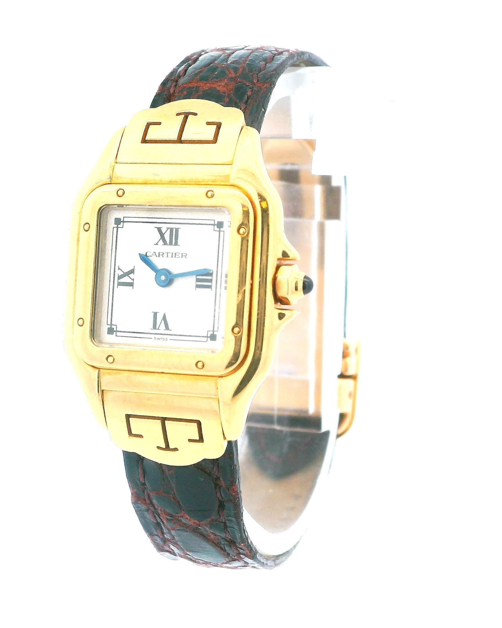 Cartier Panthere Les Styles W2504431 / 1070 Ladies Watch. 22mm 18K yellow gold case. 18K yellow gold smooth bezel. White dial with blue steel hands and Roman numeral hour markers. Black leather strap with deployment clasp. Will fit up to a 6.25-inch