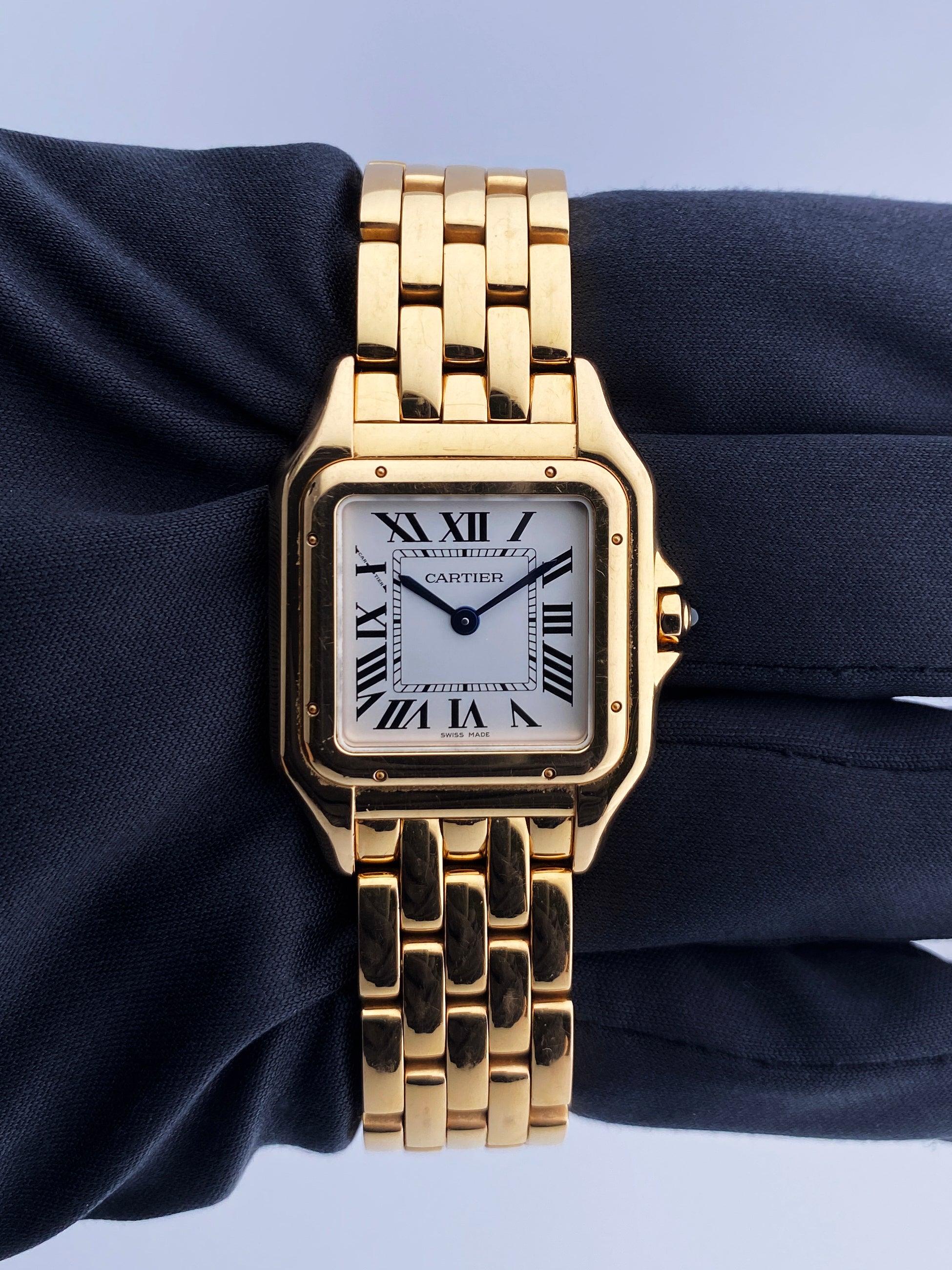 Cartier Panthere WGPN0007 Ladies Watch. 27mm 18K rose gold case. 18K rose gold  bezel. Silver dial with blue steel hands and black Roman numeral hour markers. Minute markers on the inner dial. 18k rose gold bracelet with hidden butterfly clasp. Will