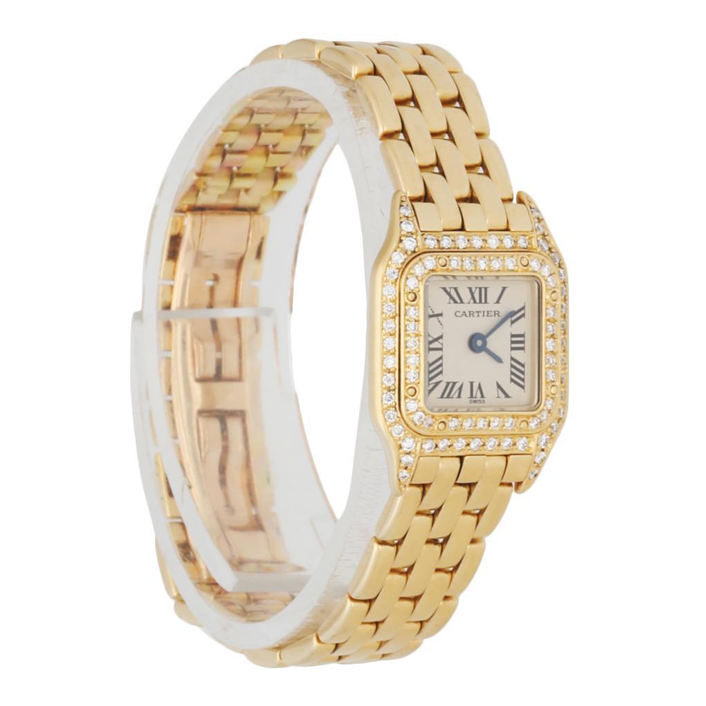 Cartier Panthere 1131-1 ladies watch. 17mm 18K yellow gold case with factory set diamond and factory set diamond bezel. Off-White dial with blue steel hands and black Roman numeral hour markers. 18K Yellow gold bracelet with hidden butterfly clasp