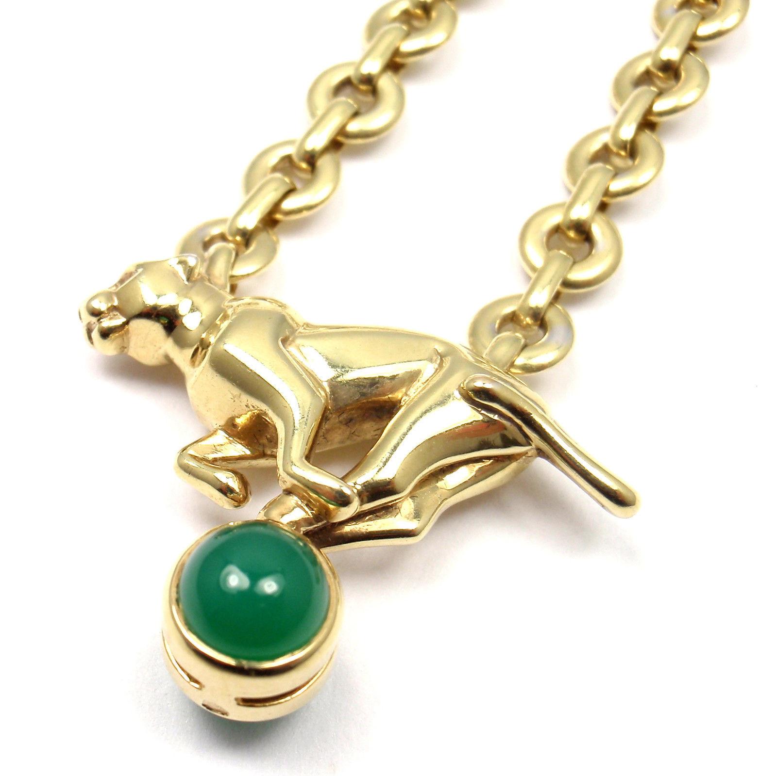 18k Yellow Gold Panther Green Chalcedony Pendant Necklace by Cartier. 
With 2 round green chalcedony stones 6mm each.
Details:
Length: 20