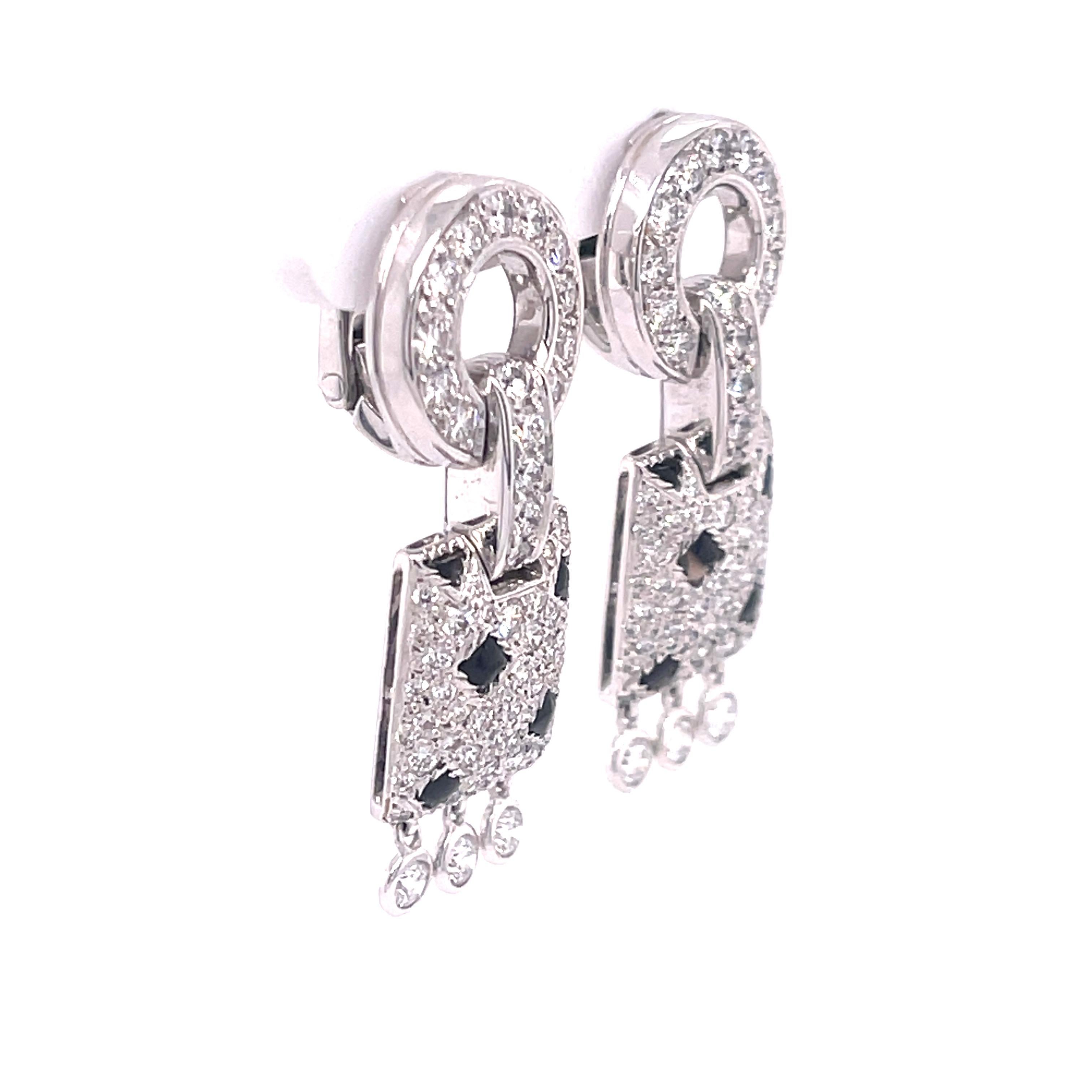 Cartier Panthere Pelage Onyx and Diamond Earrings in 18K White Gold. The earrings feature approximately 1ctw of brilliant cut diamonds, G+ color, VS clarity. 