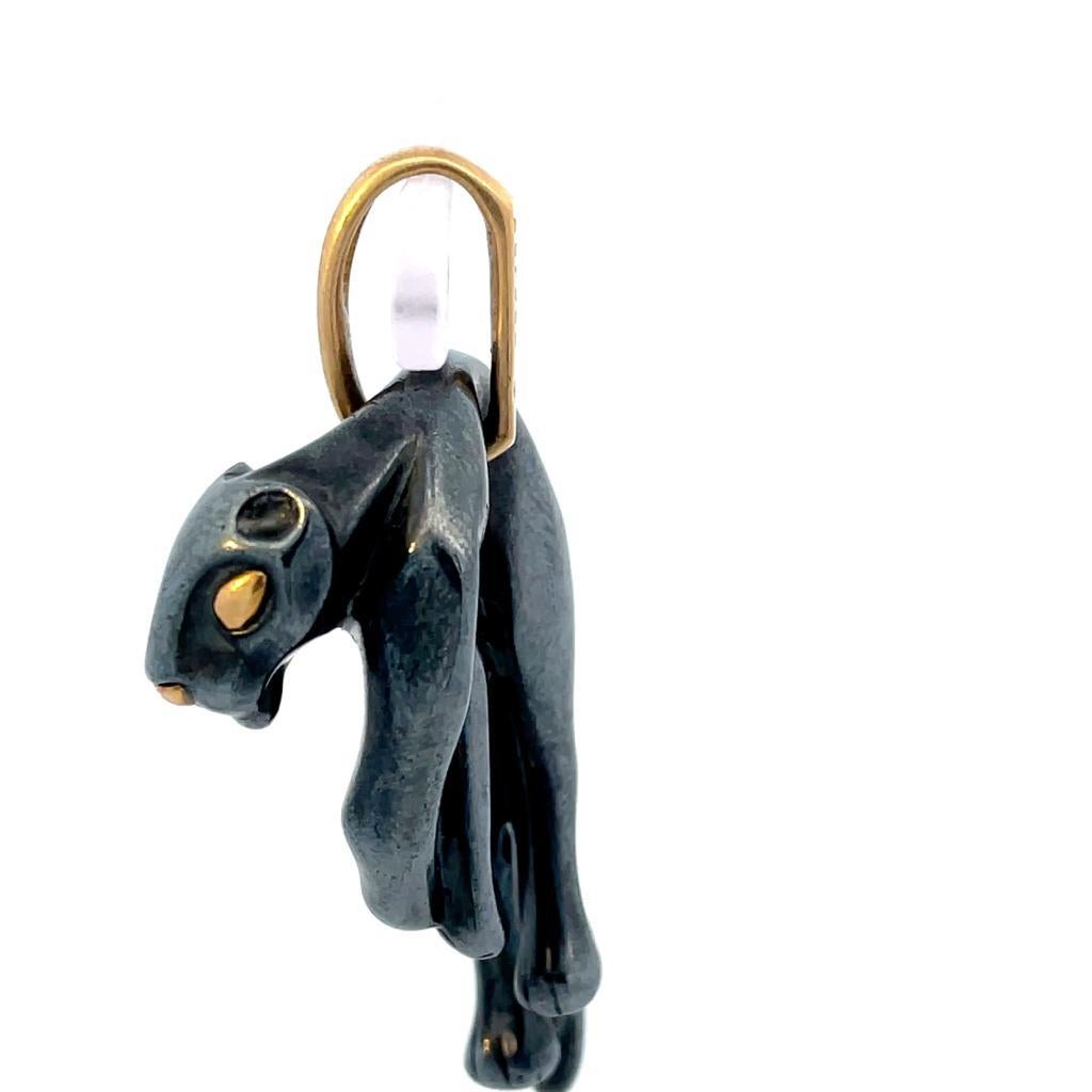 Panthere pendant designed by Cartier.
An iconic piece, created in Paris France by the jewelry house of Cartier, back in the 1970-1980. The design feature the stylized Panther Animal, hanging from the body to the right with the eyes and the nose