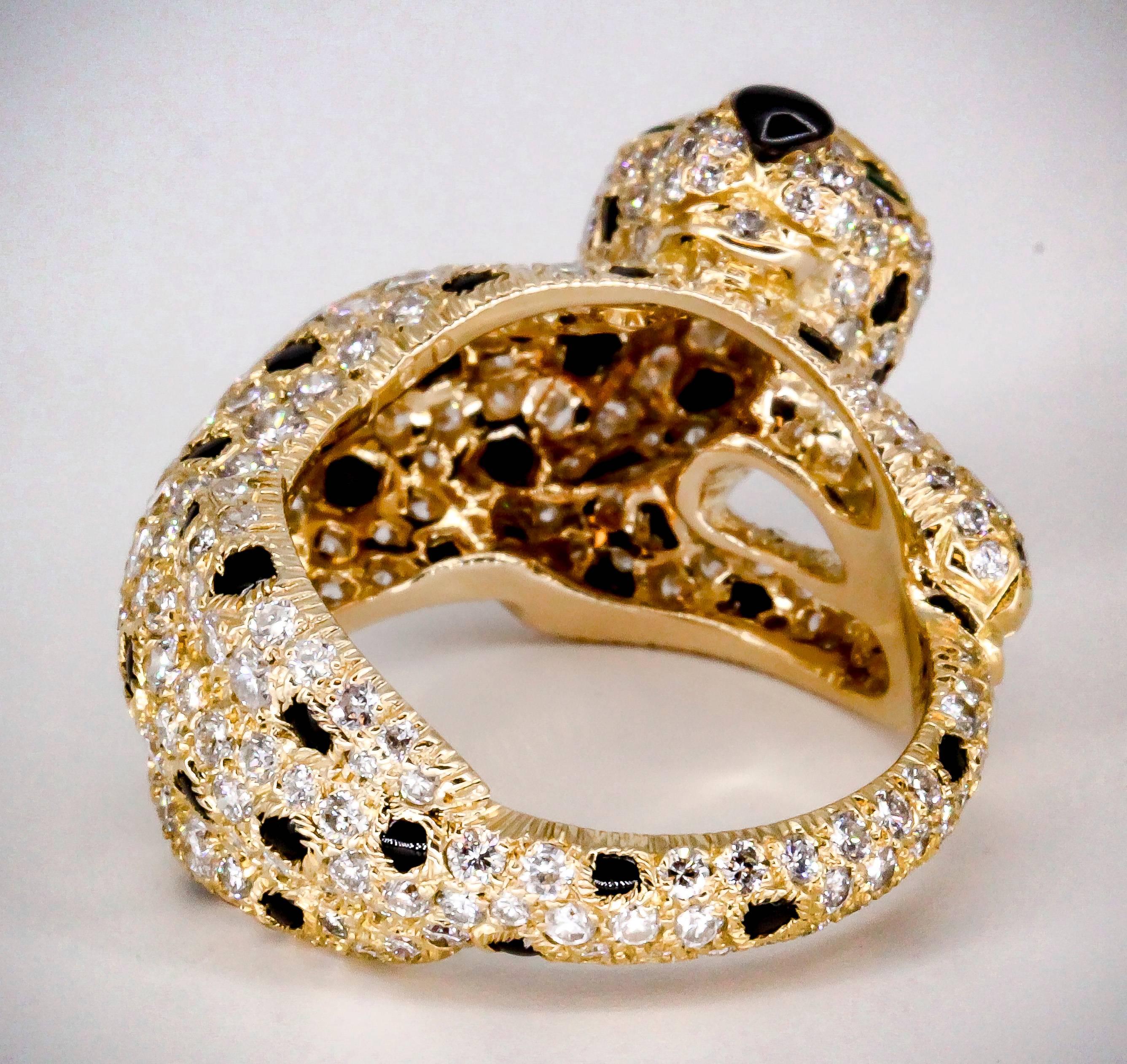 Cartier Panthere Rare Diamond Emerald, Onyx and Gold Ring In Excellent Condition In New York City, NY