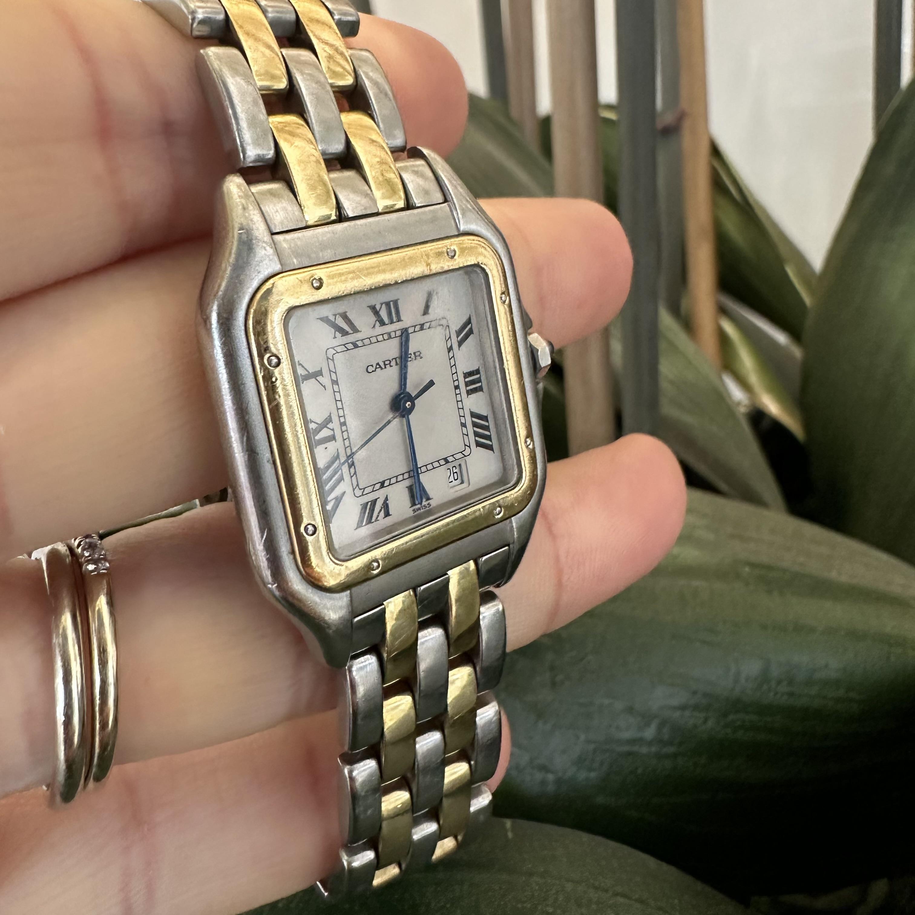 Brand: Cartier
Model: Panthere de Cartier
Model Number: 187949
Case Material: 18k Yellow Gold / Stainless Steel
Case Size: 27 mm
Dial: White
Bezel: Gold
Bracelet: 18k Yellow Gold / Stainless Steel - Two Row
Movement: Quartz
Year: 1990
Box & Papers: