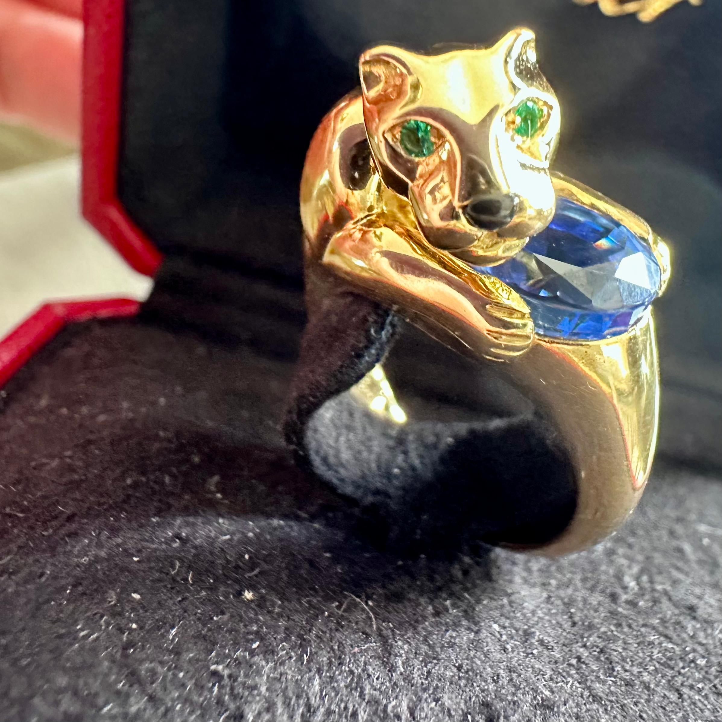 Cartier Paris Panther Blue Sapphire  Ring containing a Beautiful 4.32 cts Oval Blue Sapphire 
Origin: Sri Lanka
No Heat sapphire
GIA certificate 7192627947 No Heat
Size 8 
Hallmarked: Cartier and numbers